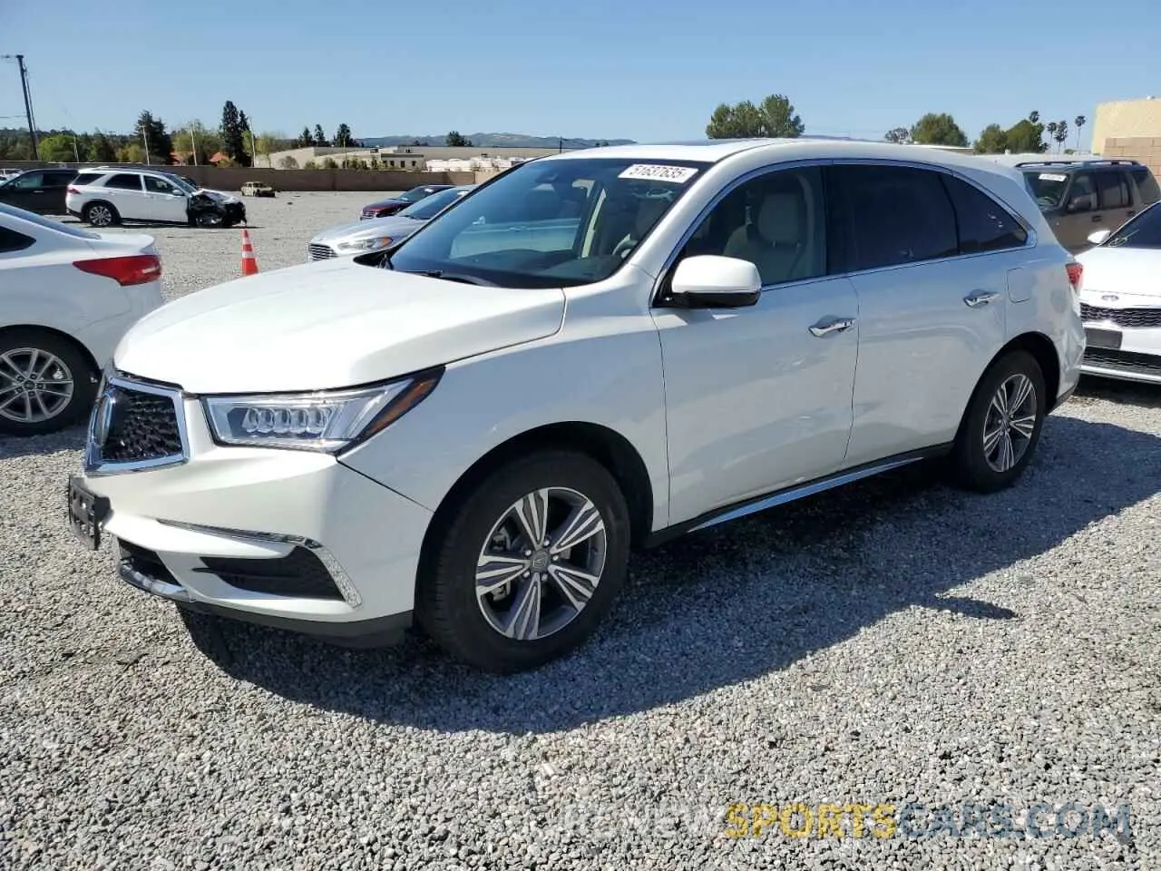 1 Photograph of a damaged car 5J8YD3H32KL009499 ACURA MDX 2019