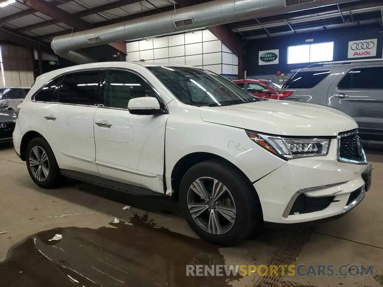 4 Photograph of a damaged car 5J8YD4H31KL031239 ACURA MDX 2019