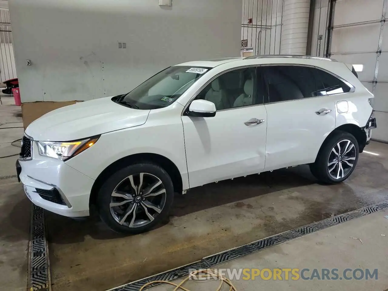 1 Photograph of a damaged car 5J8YD4H81KL003761 ACURA MDX 2019