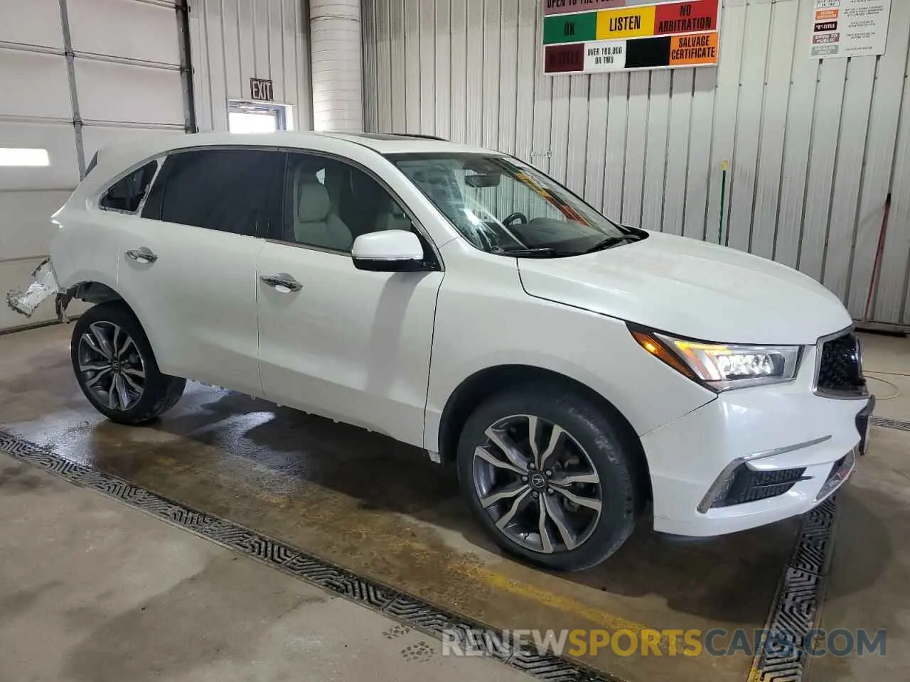 4 Photograph of a damaged car 5J8YD4H81KL003761 ACURA MDX 2019