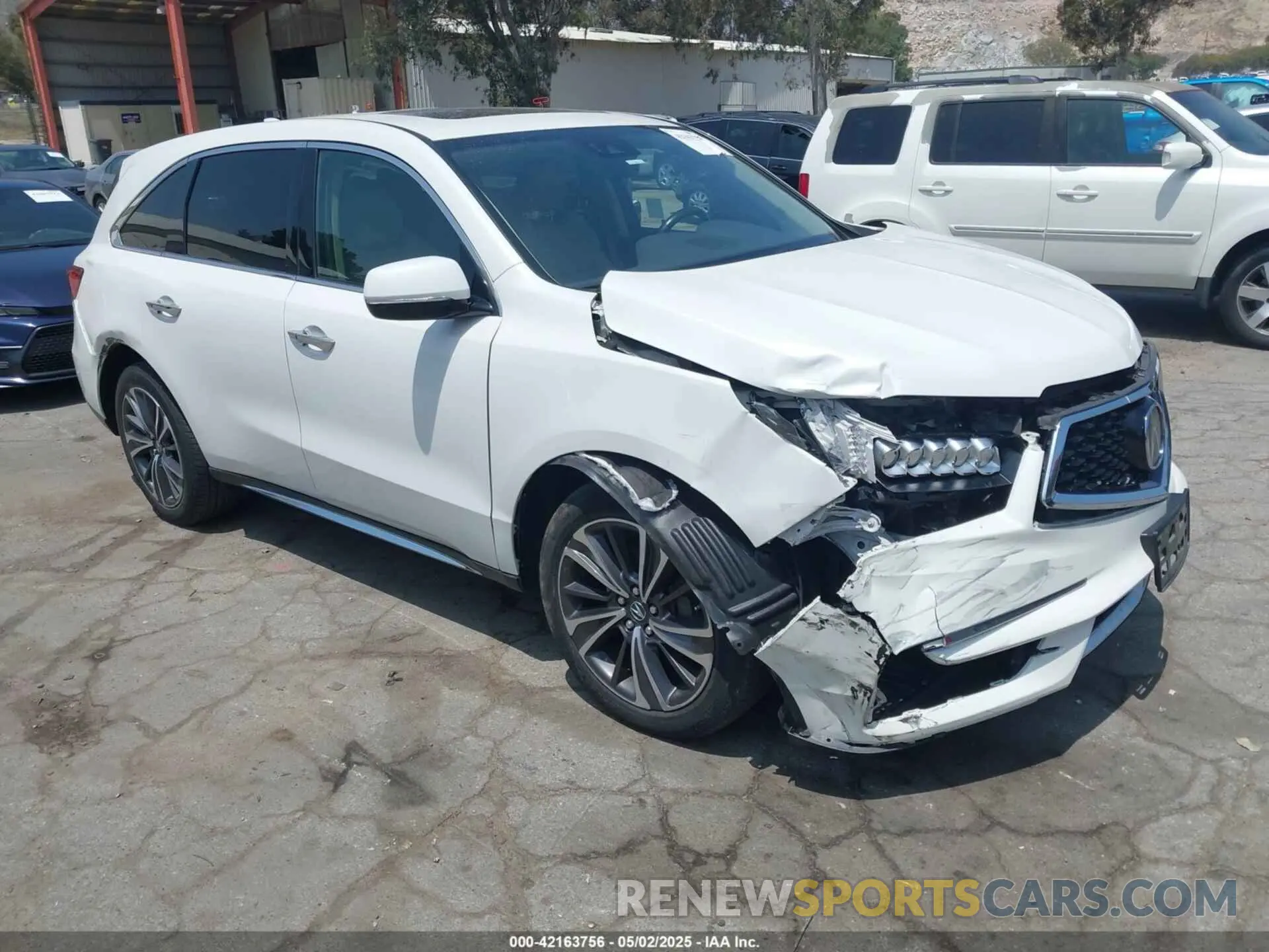 1 Photograph of a damaged car 5J8YD3H54LL001794 ACURA MDX 2020