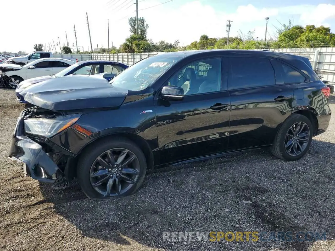 1 Photograph of a damaged car 5J8YD4H01LL020247 ACURA MDX 2020