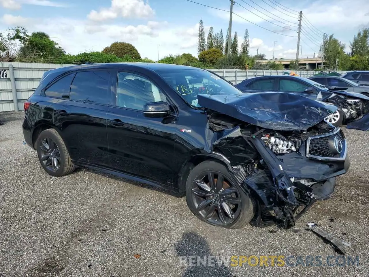 4 Photograph of a damaged car 5J8YD4H01LL020247 ACURA MDX 2020