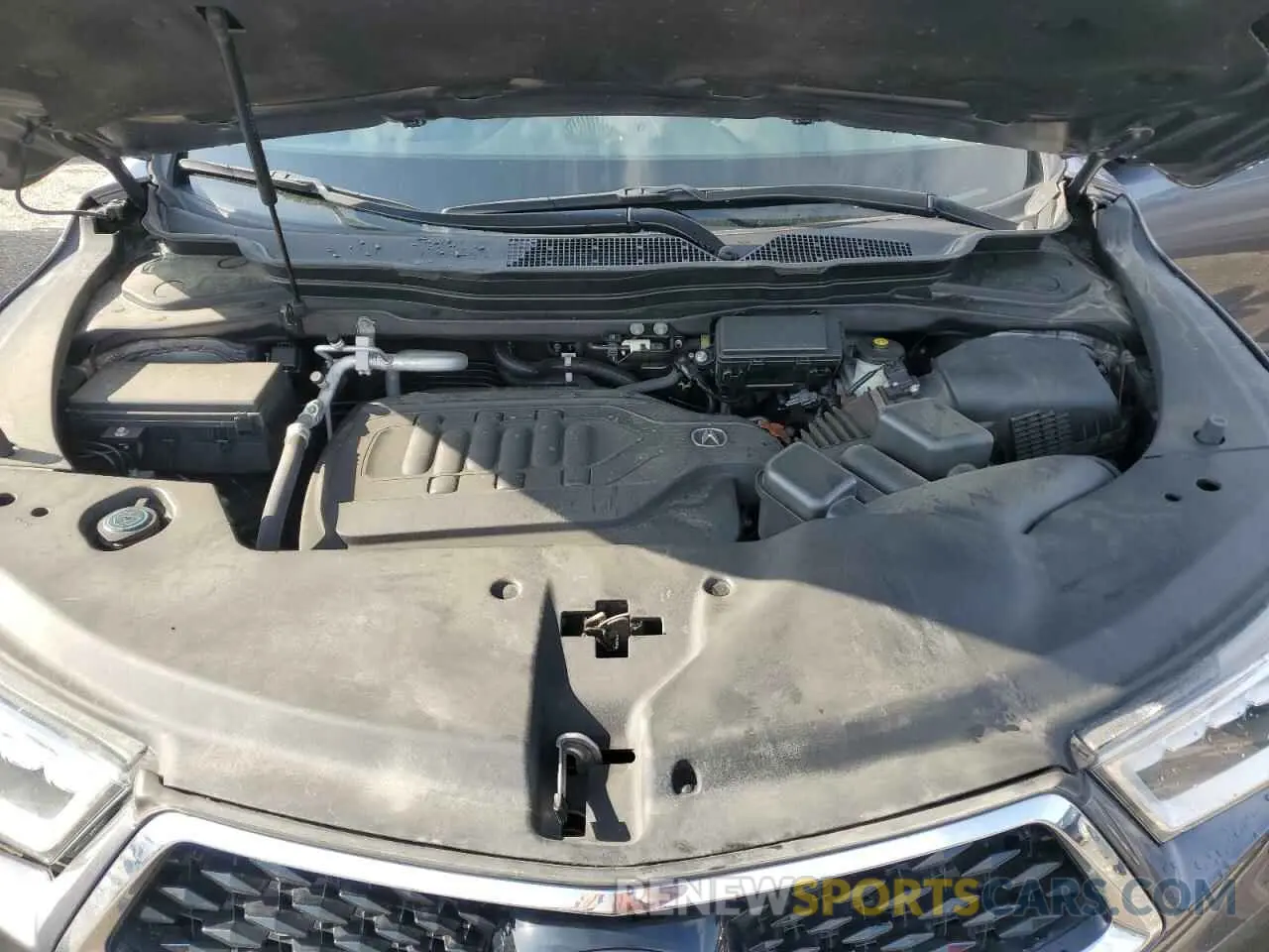 12 Photograph of a damaged car 5J8YD4H30LL047577 ACURA MDX 2020