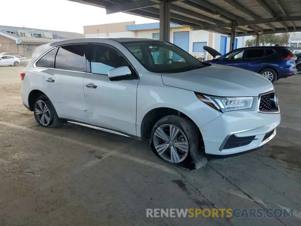 4 Photograph of a damaged car 5J8YD4H33LL034029 ACURA MDX 2020