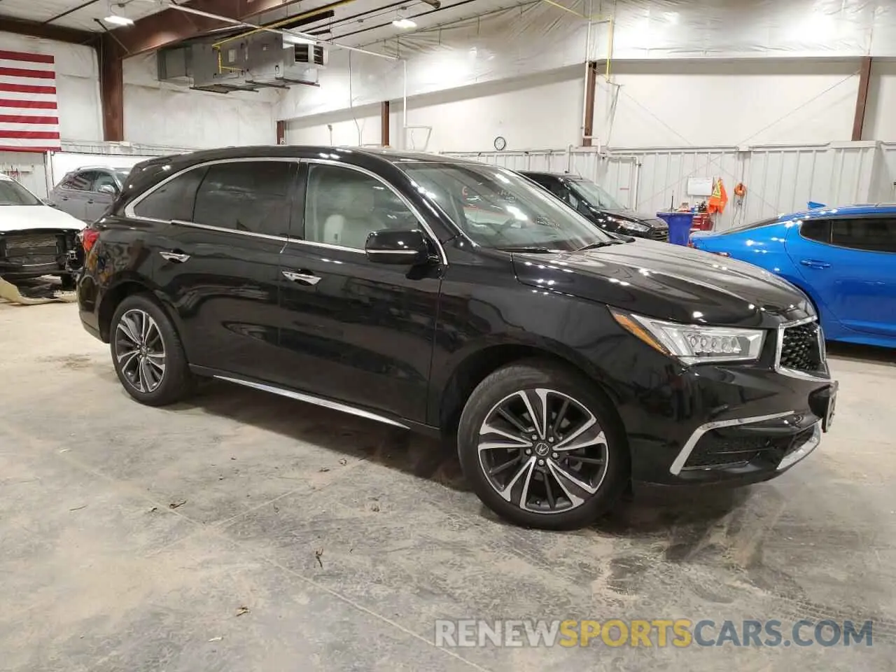4 Photograph of a damaged car 5J8YD4H54LL012624 ACURA MDX 2020