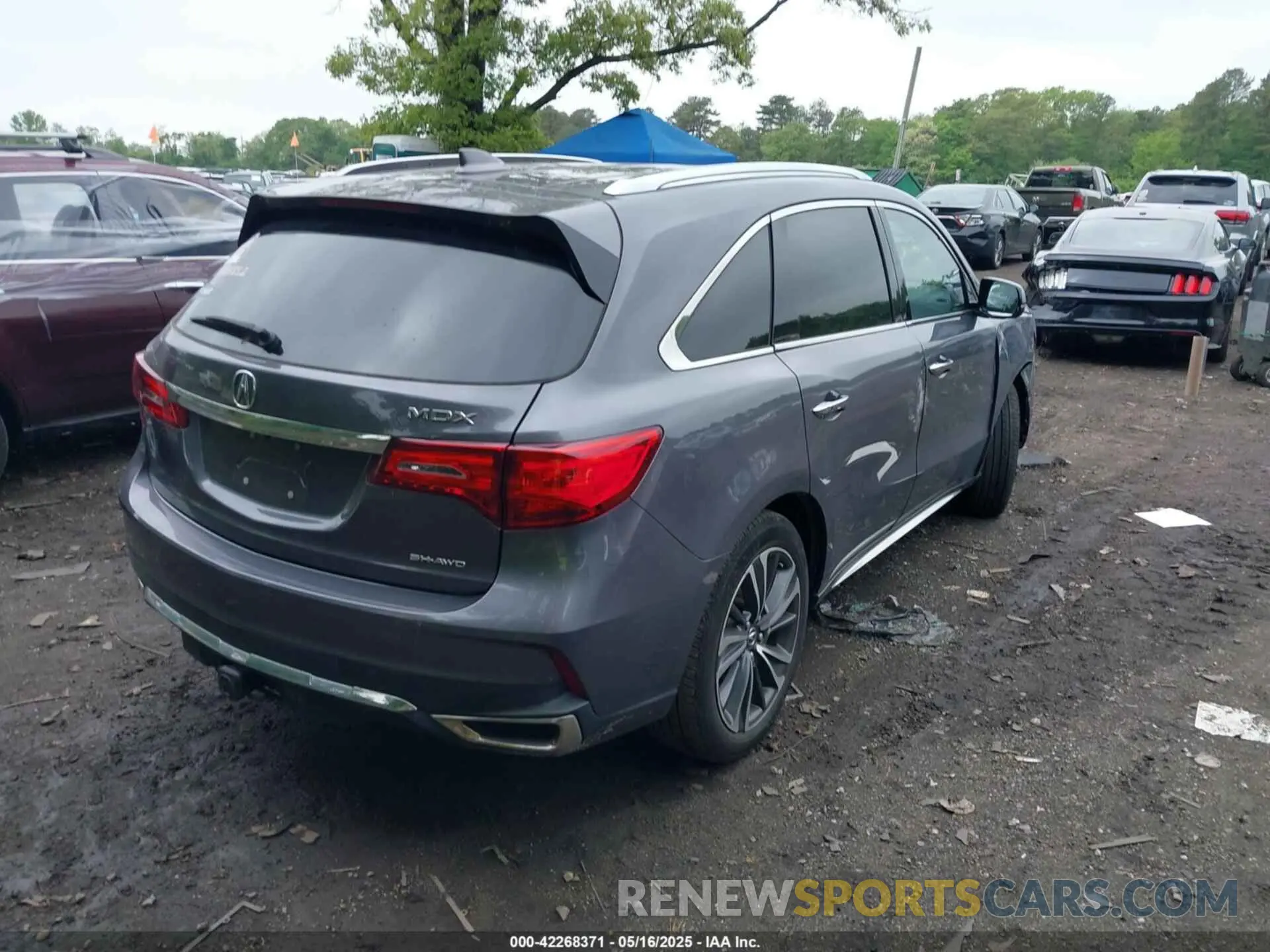 4 Photograph of a damaged car 5J8YD4H59LL033422 ACURA MDX 2020