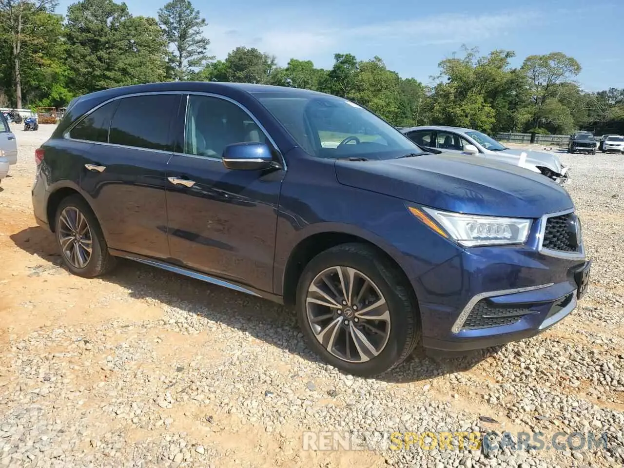 4 Photograph of a damaged car 5J8YD4H5XLL017083 ACURA MDX 2020