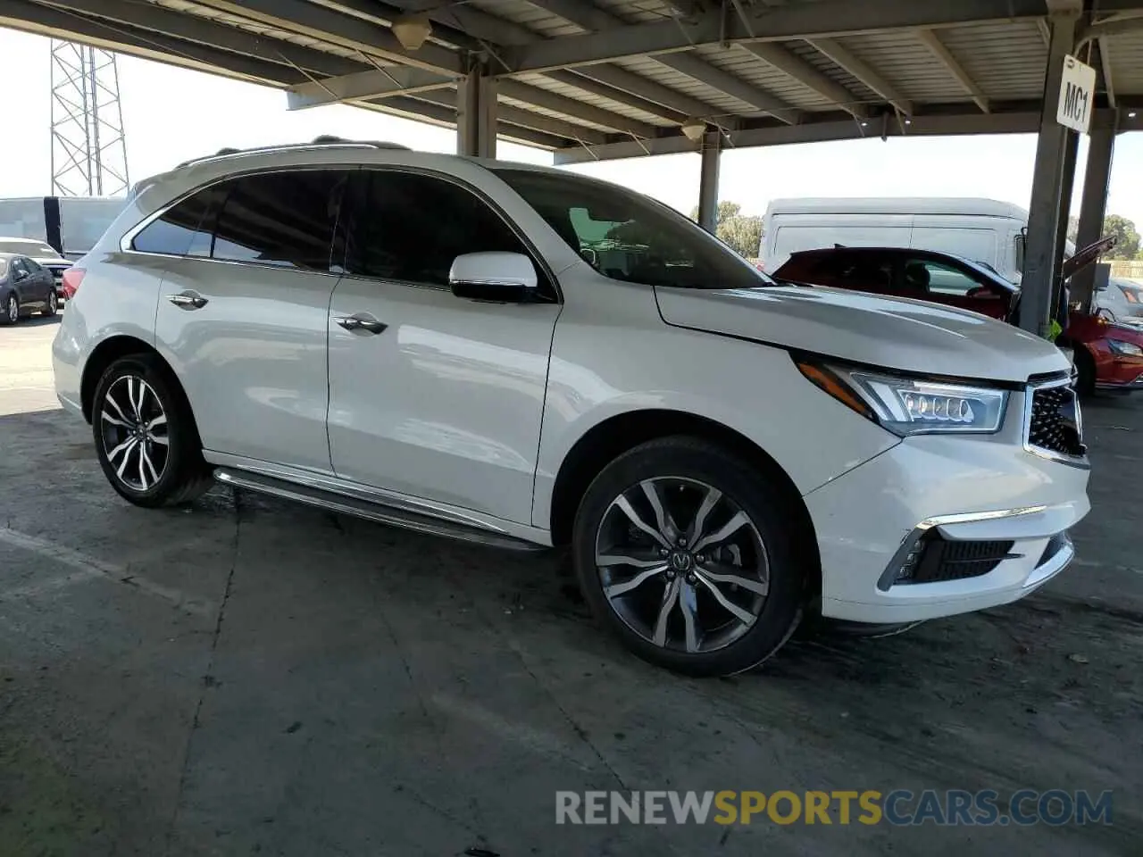 4 Photograph of a damaged car 5J8YD4H82LL014589 ACURA MDX 2020