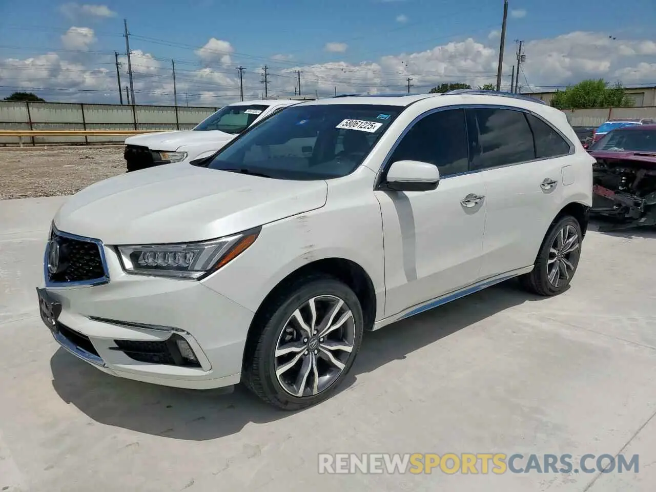 1 Photograph of a damaged car 5J8YD4H91LL011529 ACURA MDX 2020