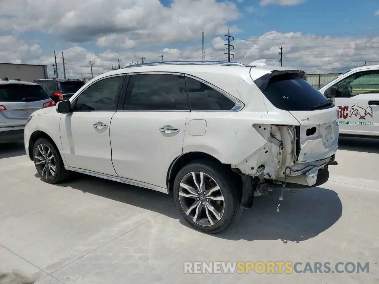 2 Photograph of a damaged car 5J8YD4H91LL011529 ACURA MDX 2020