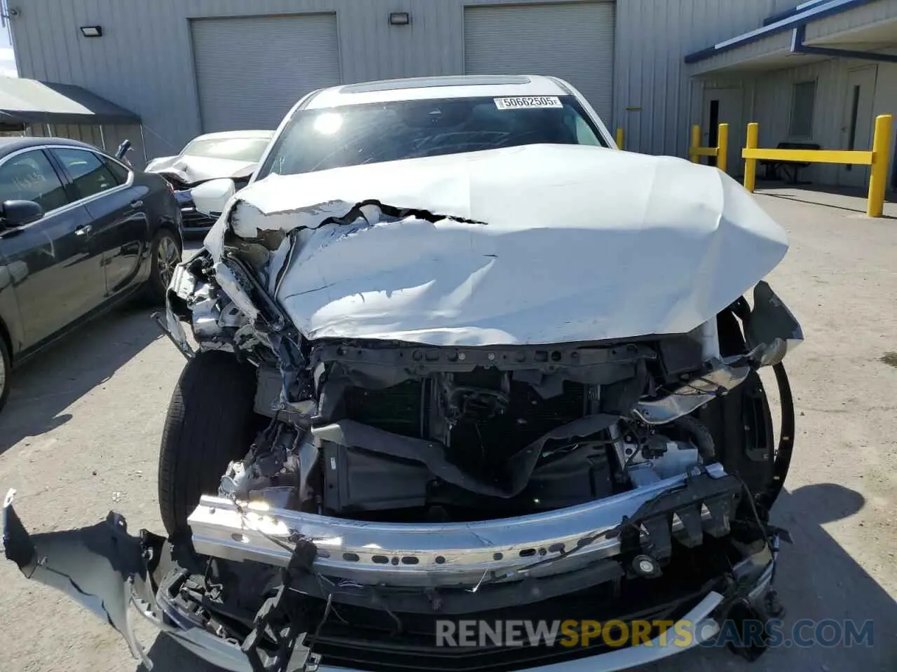 5 Photograph of a damaged car 5J8YD9H44NL011593 ACURA MDX 2022