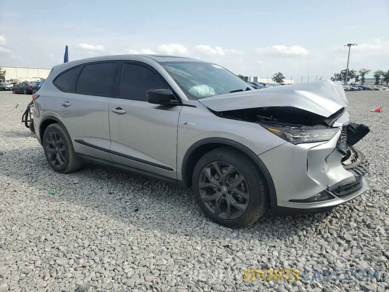 4 Photograph of a damaged car 5J8YE1H01NL020991 ACURA MDX 2022
