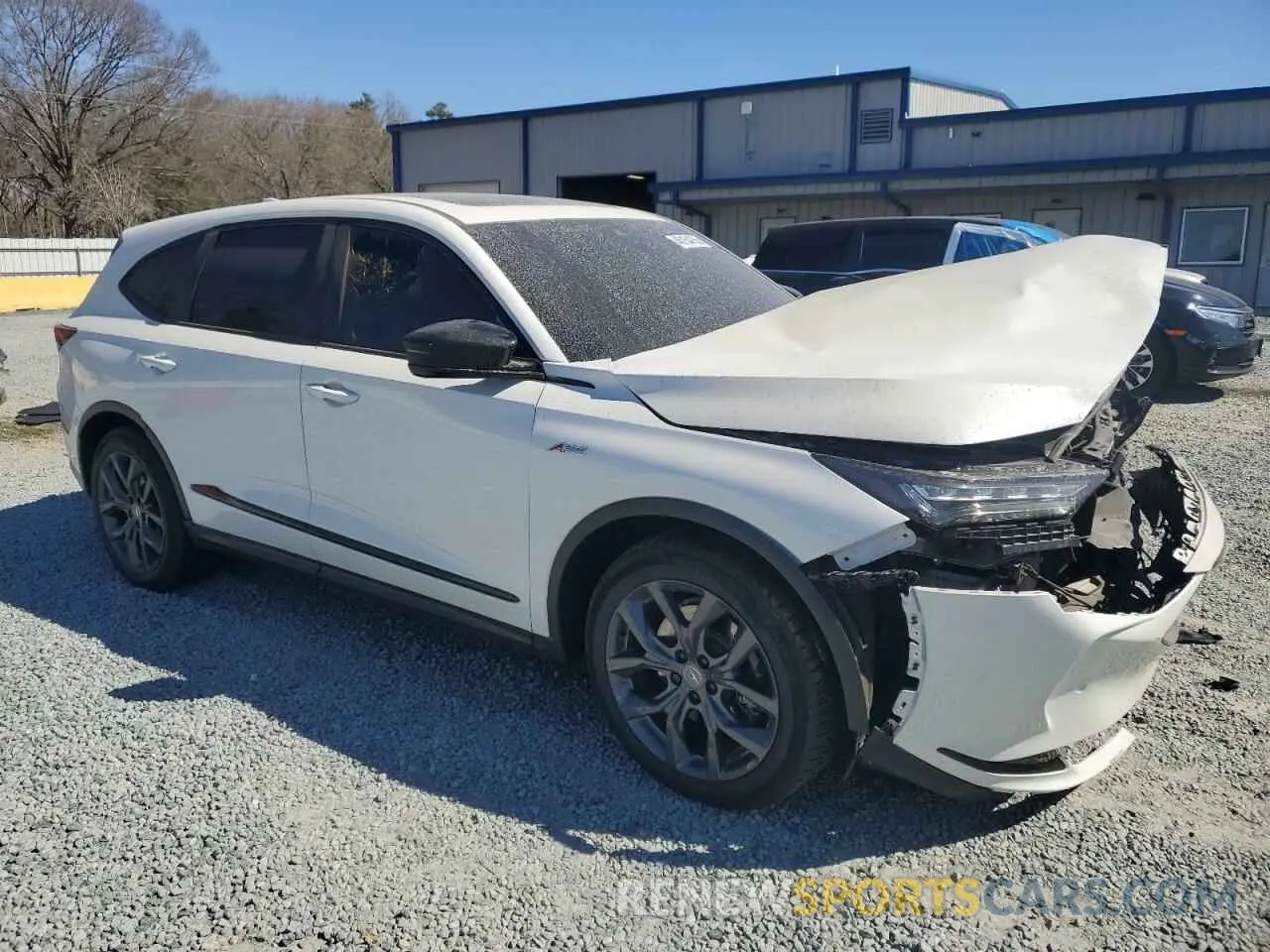 4 Photograph of a damaged car 5J8YE1H02NL032874 ACURA MDX 2022