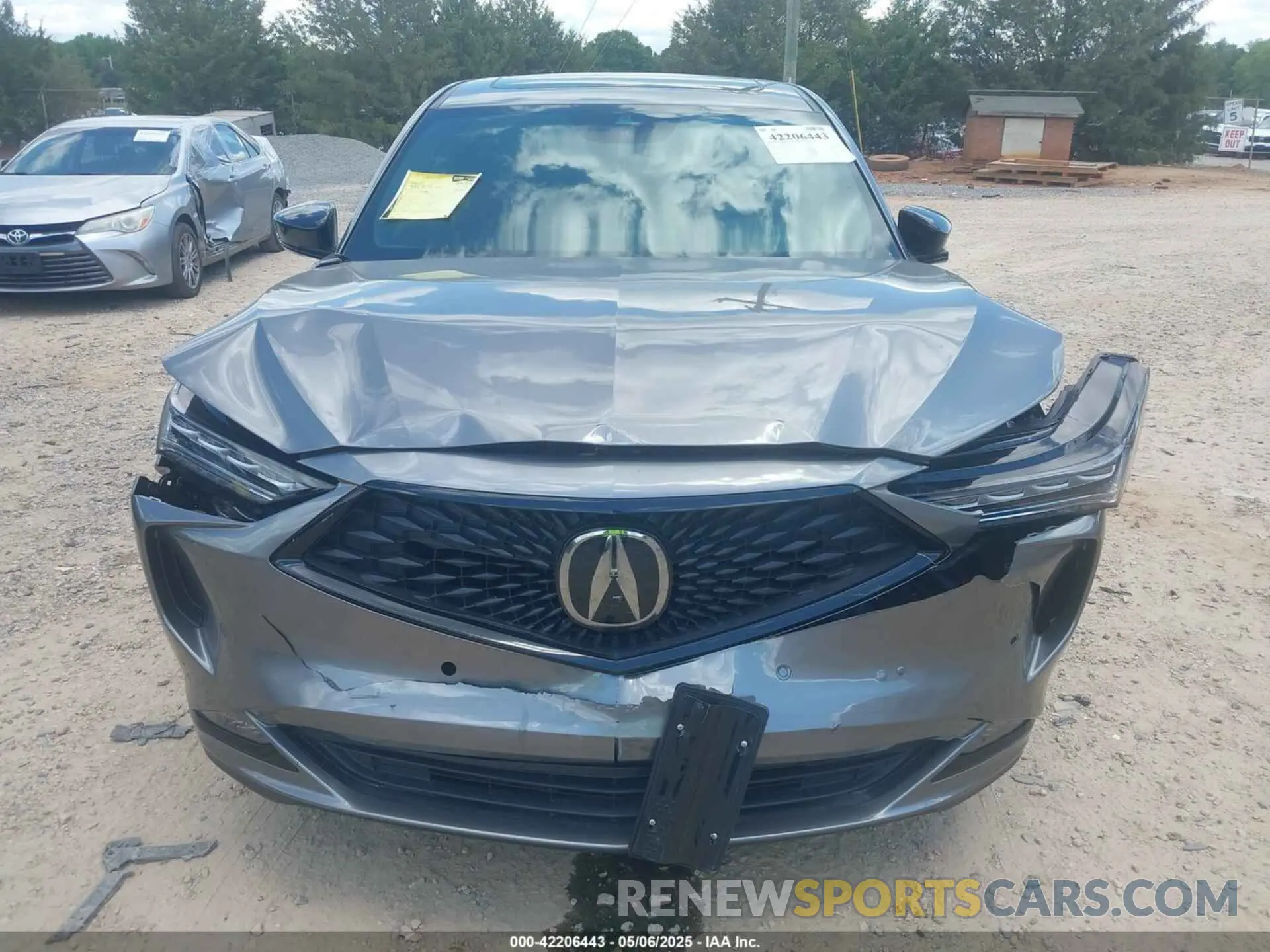 12 Photograph of a damaged car 5J8YE1H05NL018631 ACURA MDX 2022
