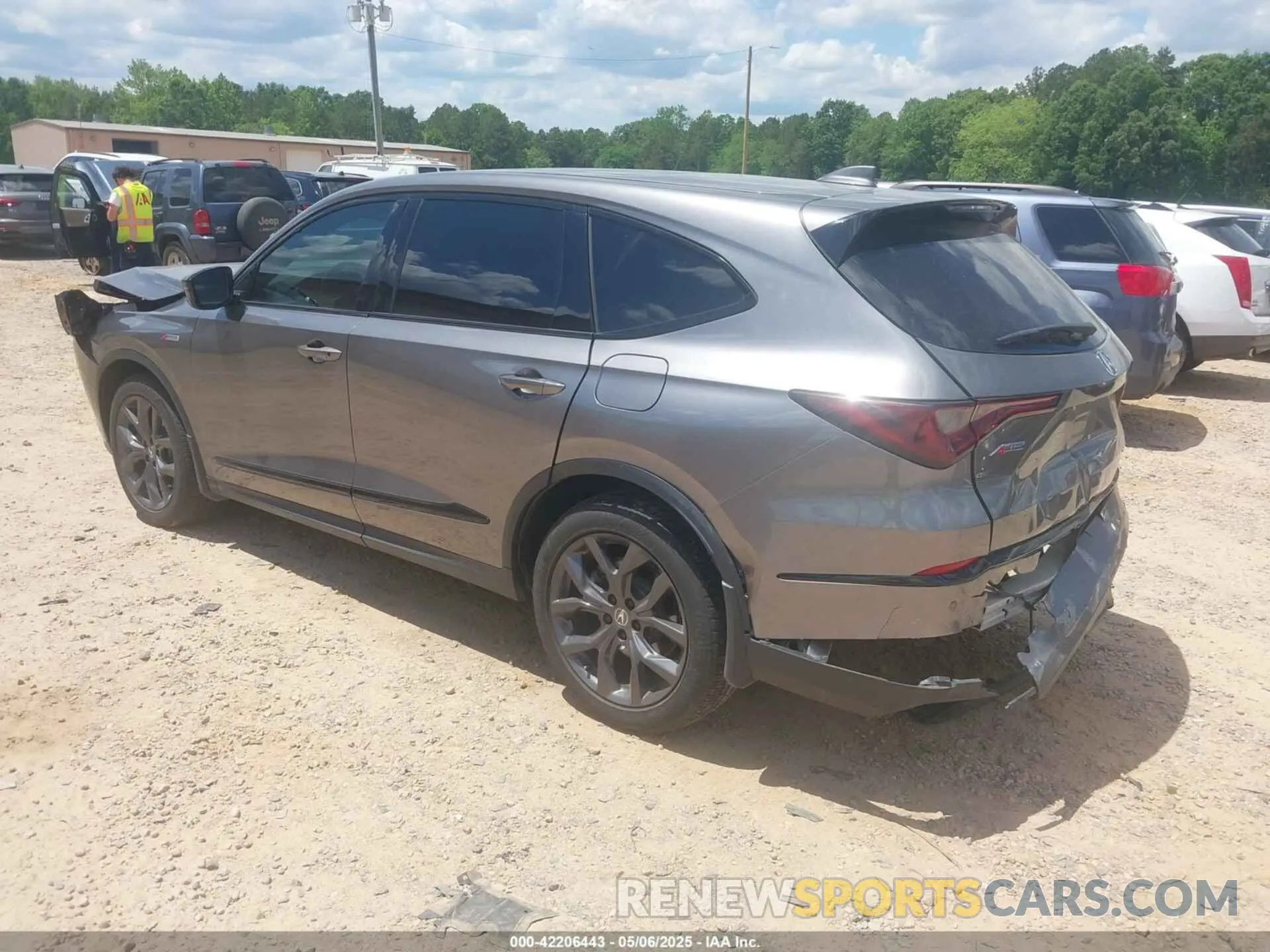 3 Photograph of a damaged car 5J8YE1H05NL018631 ACURA MDX 2022