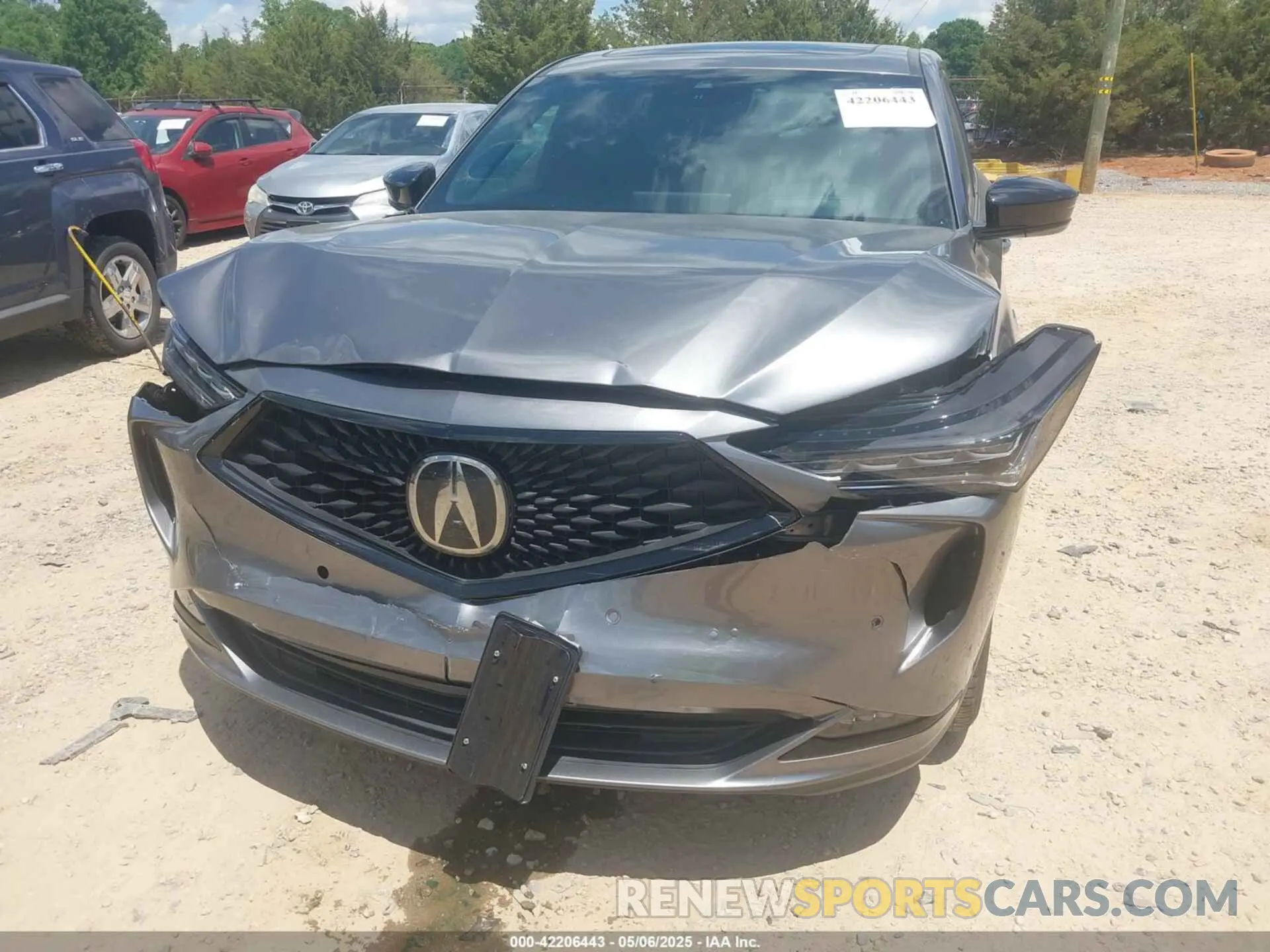 6 Photograph of a damaged car 5J8YE1H05NL018631 ACURA MDX 2022