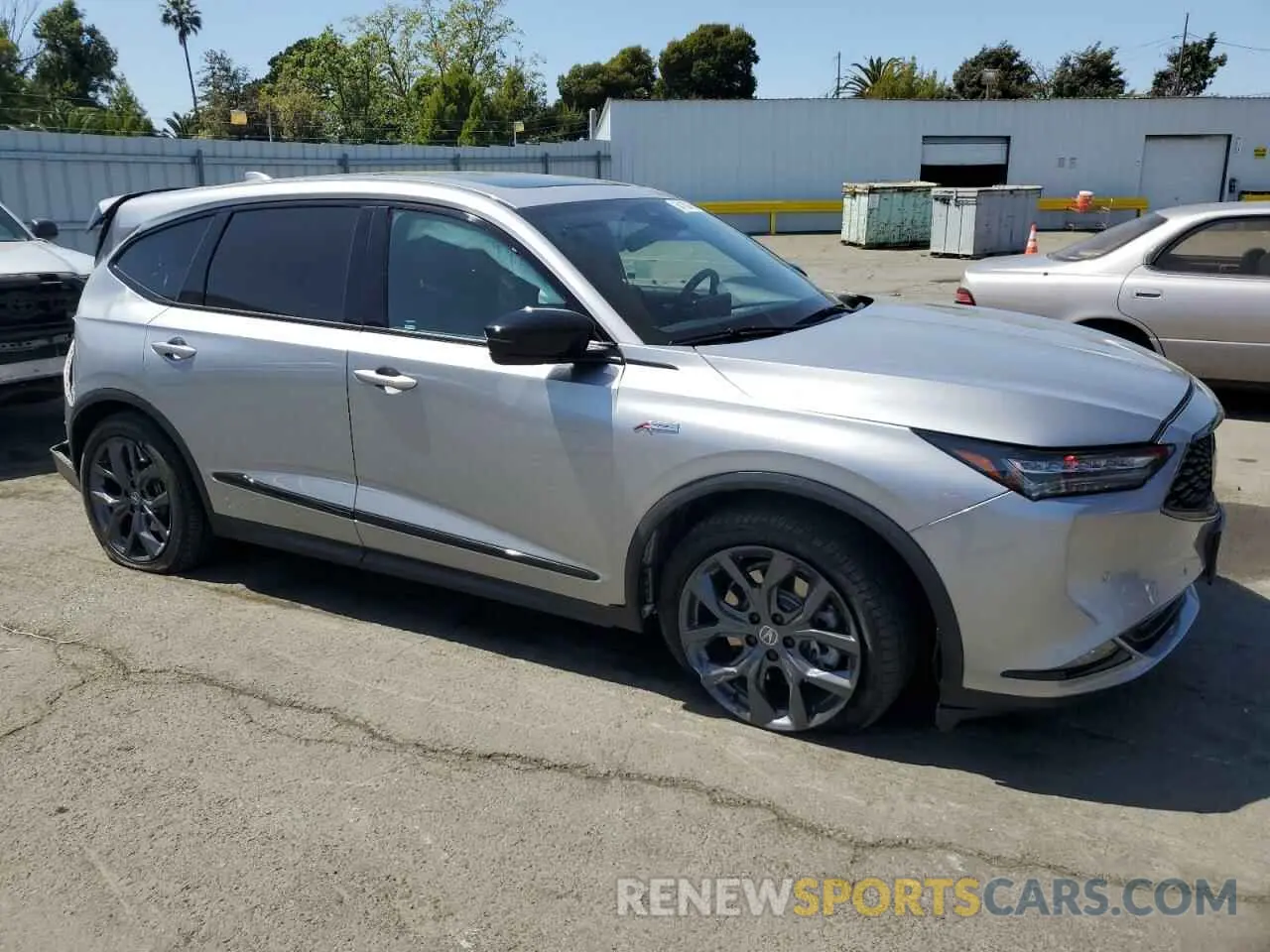 4 Photograph of a damaged car 5J8YE1H05NL024669 ACURA MDX 2022