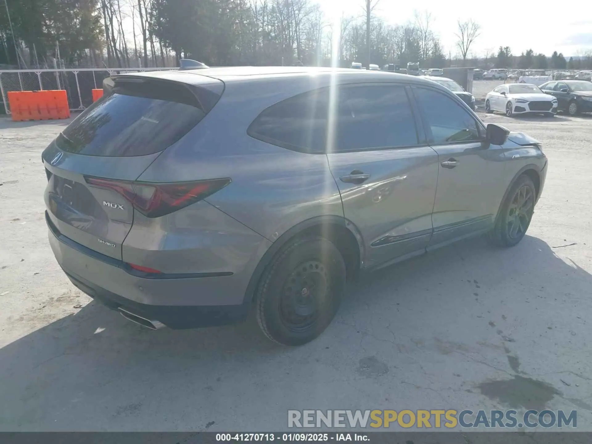 4 Photograph of a damaged car 5J8YE1H05NL029631 ACURA MDX 2022