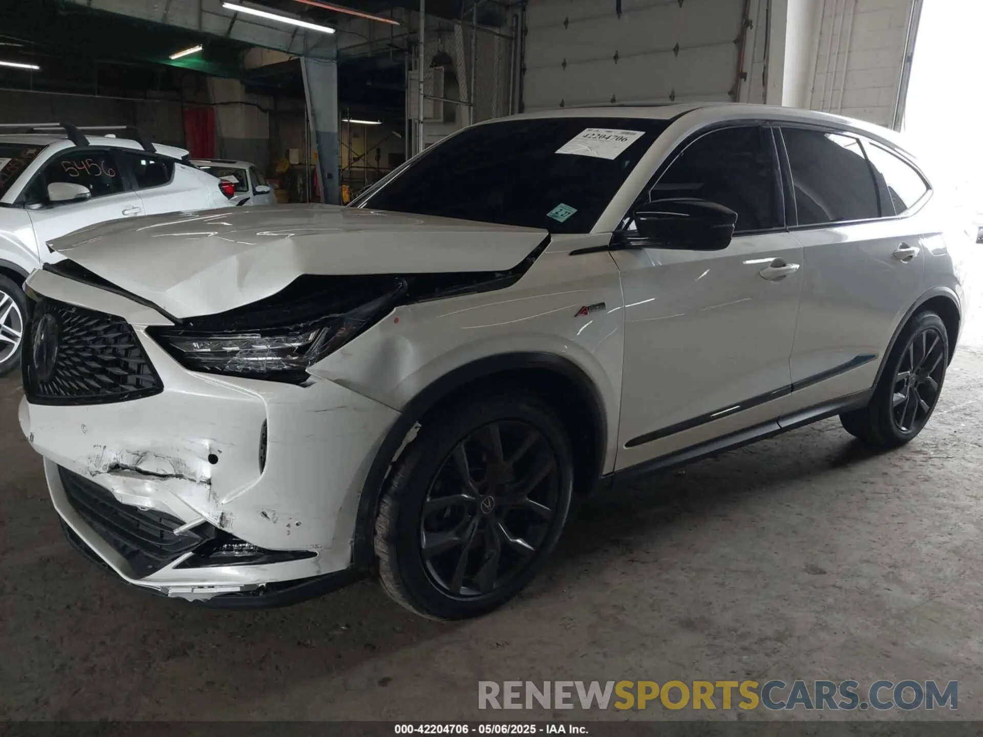 2 Photograph of a damaged car 5J8YE1H06NL038869 ACURA MDX 2022