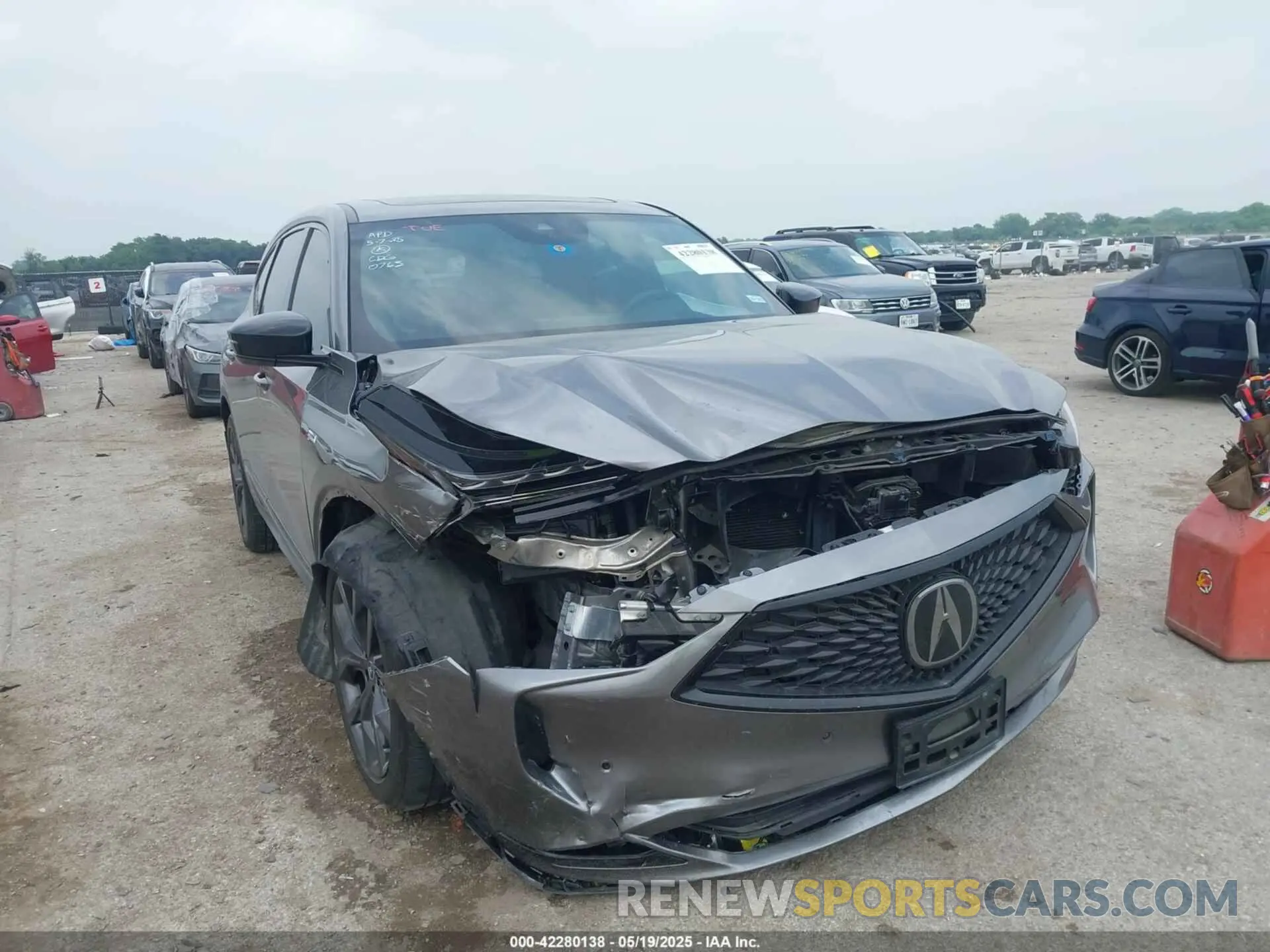 1 Photograph of a damaged car 5J8YE1H06NL050763 ACURA MDX 2022