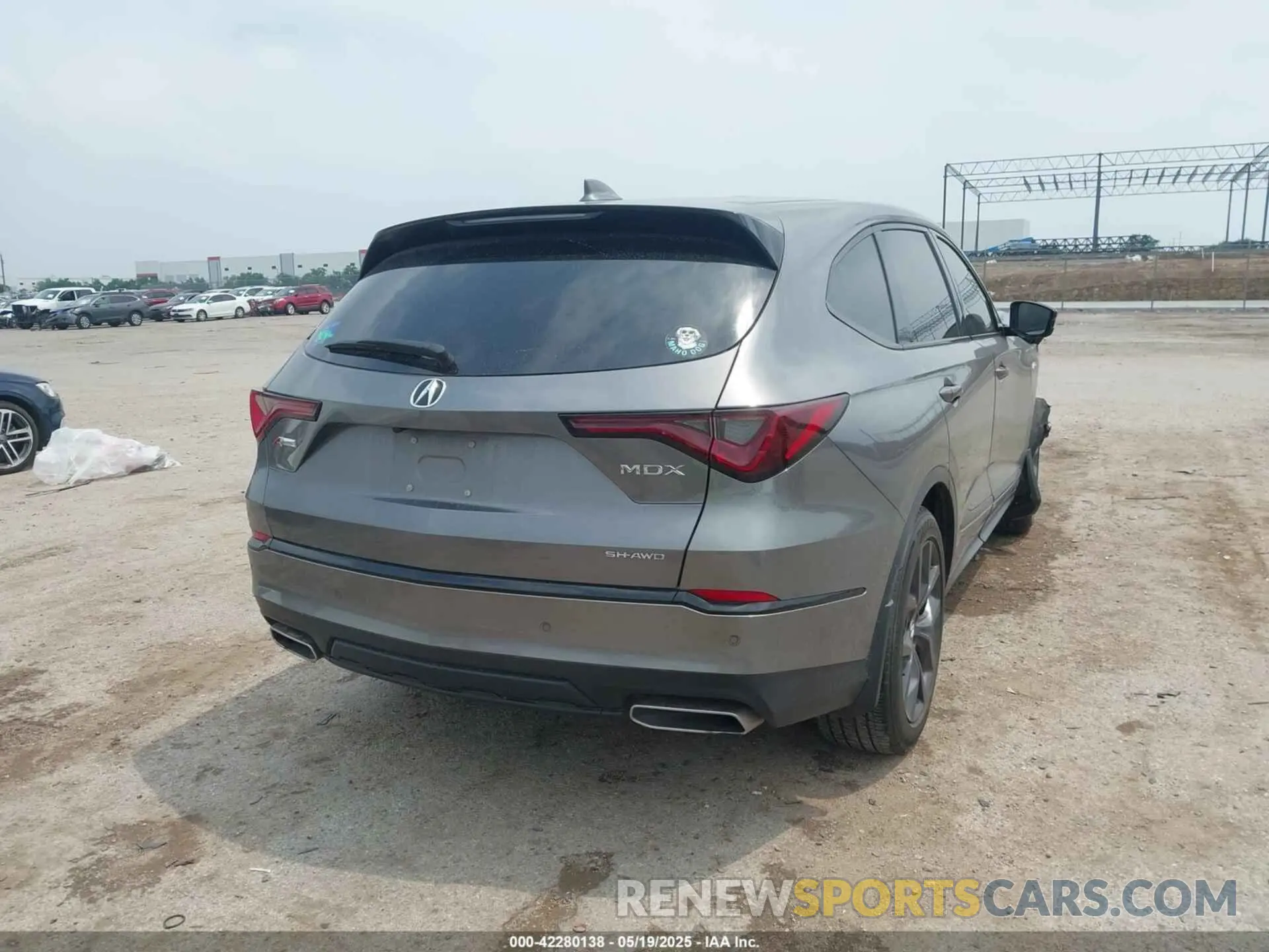 4 Photograph of a damaged car 5J8YE1H06NL050763 ACURA MDX 2022