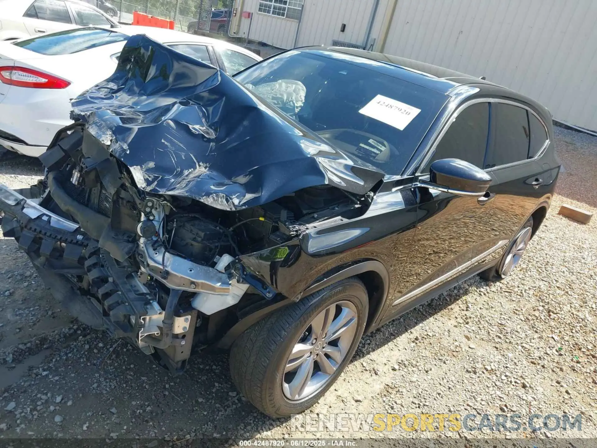 2 Photograph of a damaged car 5J8YE1H30NL012827 ACURA MDX 2022