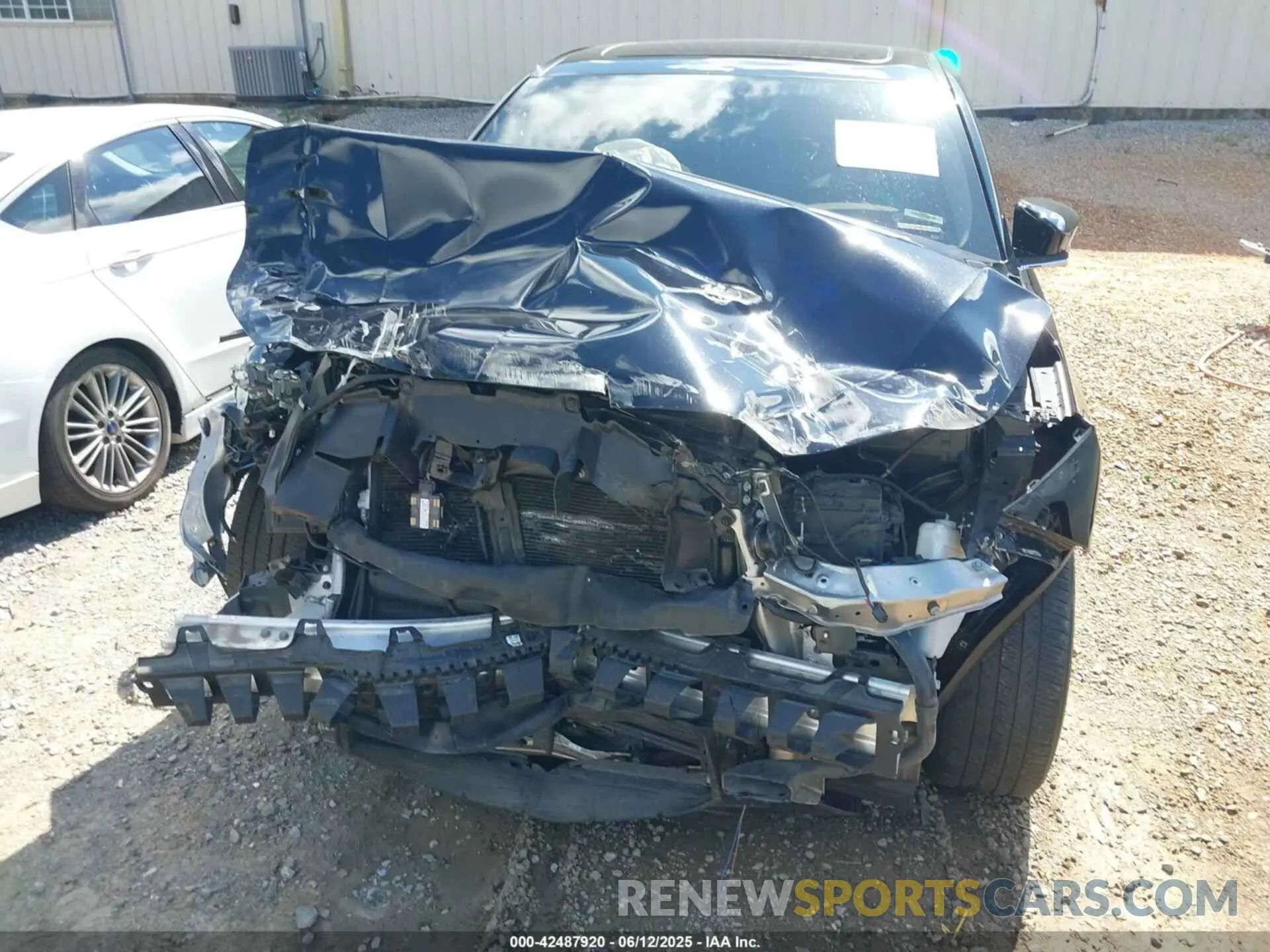 6 Photograph of a damaged car 5J8YE1H30NL012827 ACURA MDX 2022