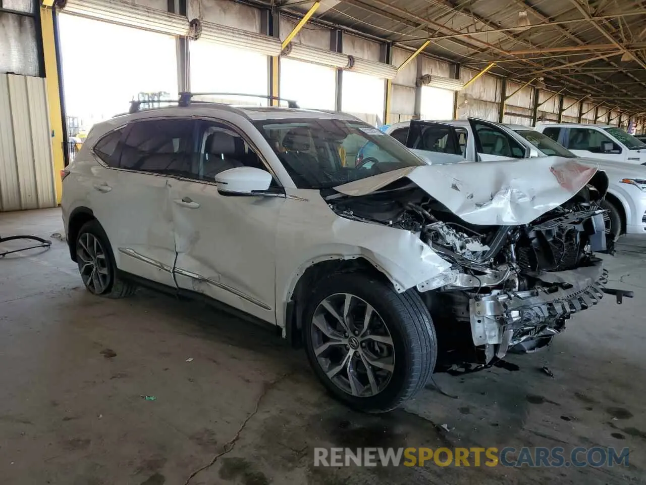 4 Photograph of a damaged car 5J8YE1H41NL020797 ACURA MDX 2022