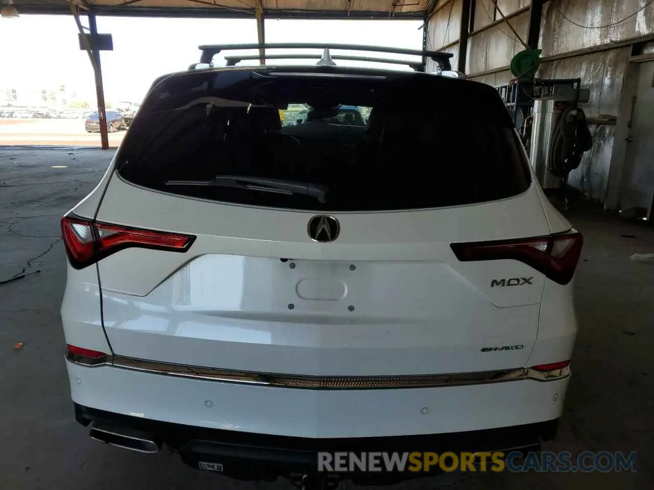 6 Photograph of a damaged car 5J8YE1H41NL020797 ACURA MDX 2022