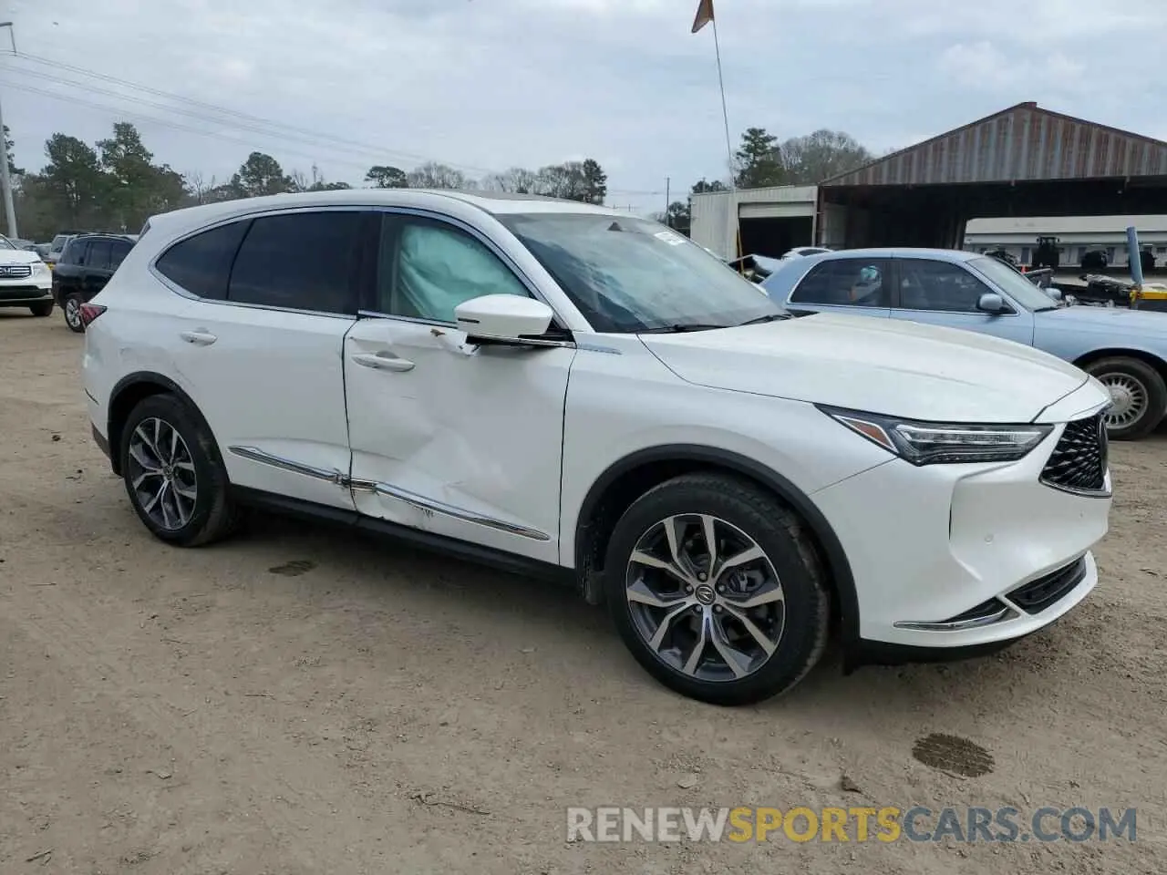 4 Photograph of a damaged car 5J8YE1H43NL026066 ACURA MDX 2022