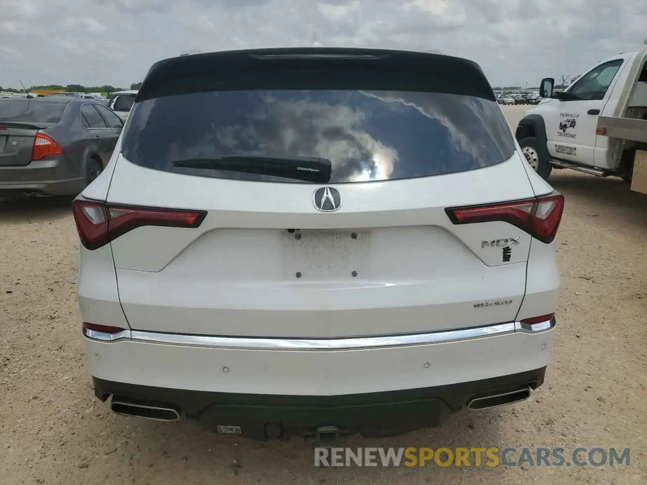 6 Photograph of a damaged car 5J8YE1H43NL051064 ACURA MDX 2022