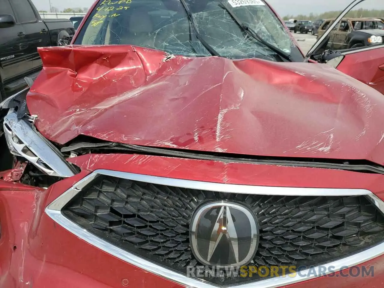 12 Photograph of a damaged car 5J8YE1H81NL000553 ACURA MDX 2022