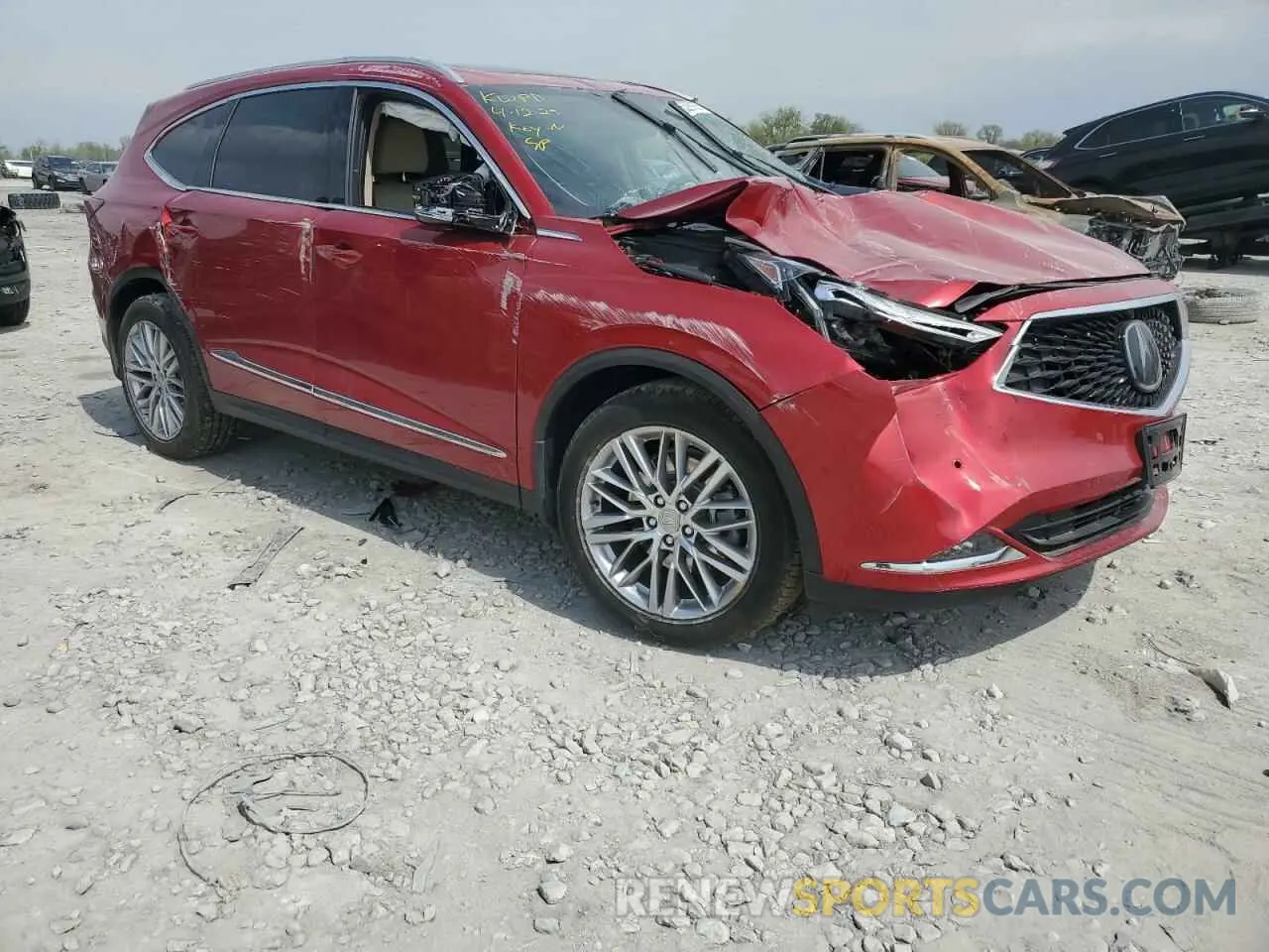 4 Photograph of a damaged car 5J8YE1H81NL000553 ACURA MDX 2022