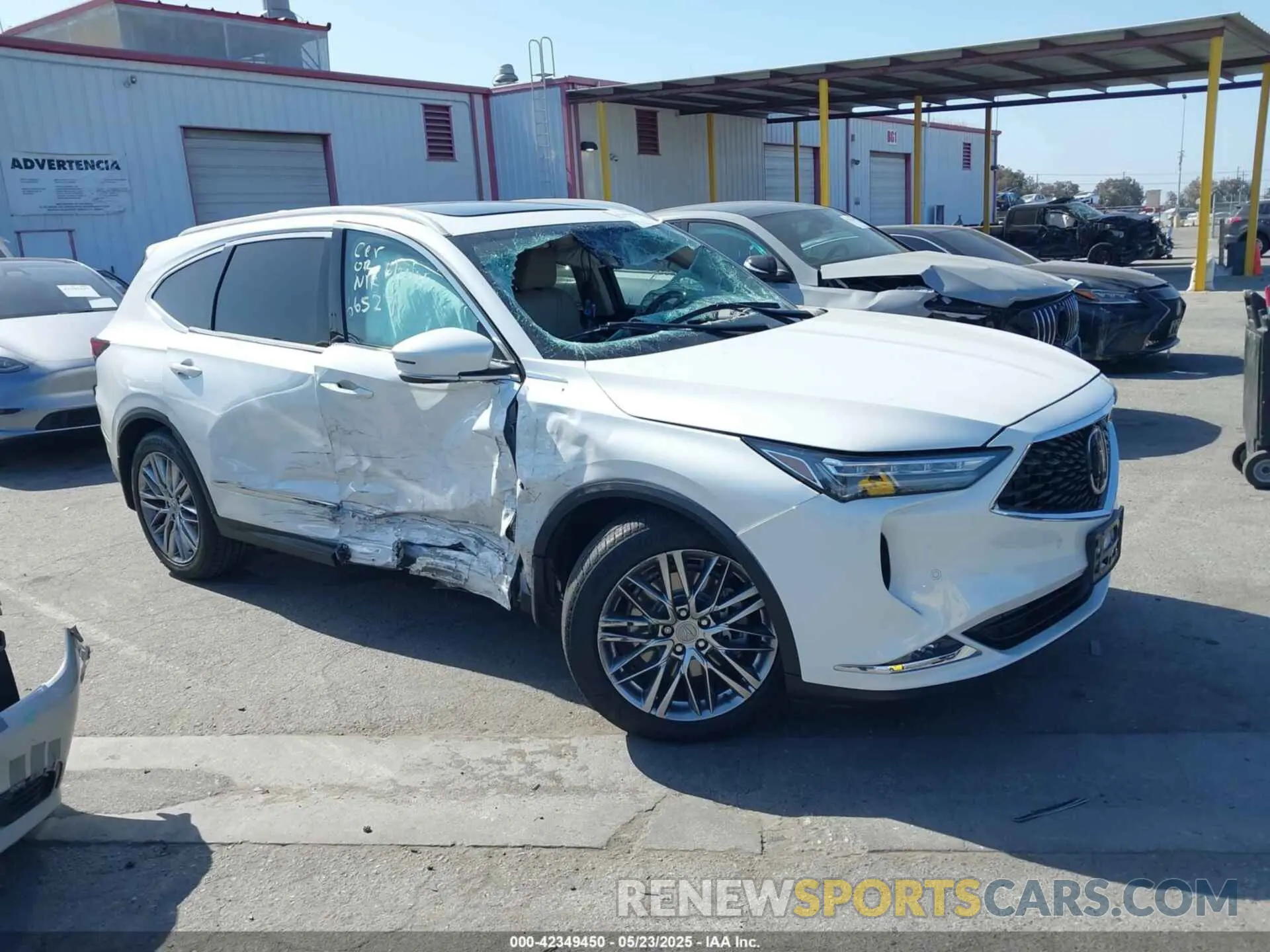 1 Photograph of a damaged car 5J8YE1H81NL039949 ACURA MDX 2022