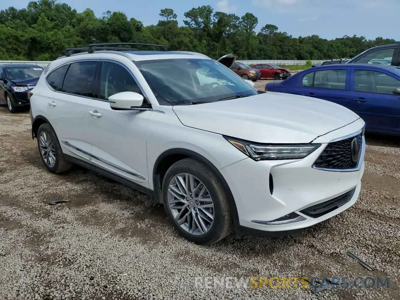 4 Photograph of a damaged car 5J8YE1H84NL041369 ACURA MDX 2022