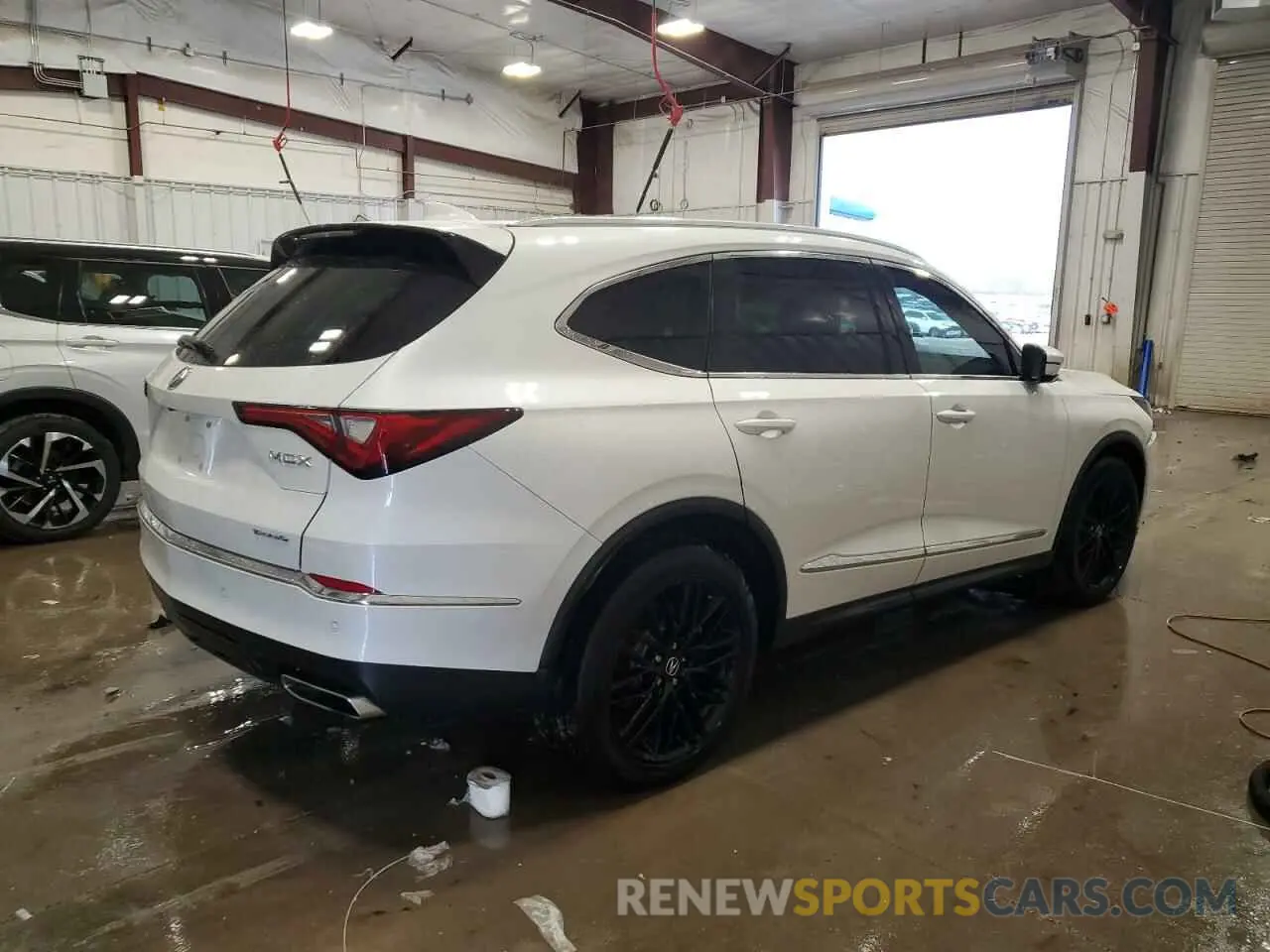 3 Photograph of a damaged car 5J8YE1H89NL040444 ACURA MDX 2022