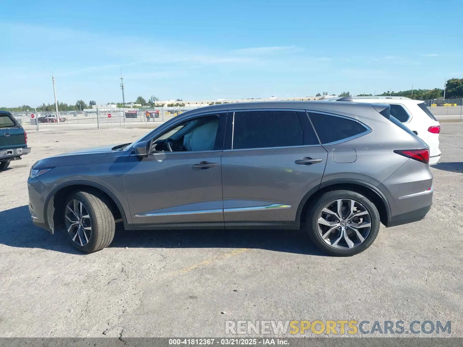 14 Photograph of a damaged car 5J8YD9H45PL006079 ACURA MDX 2023