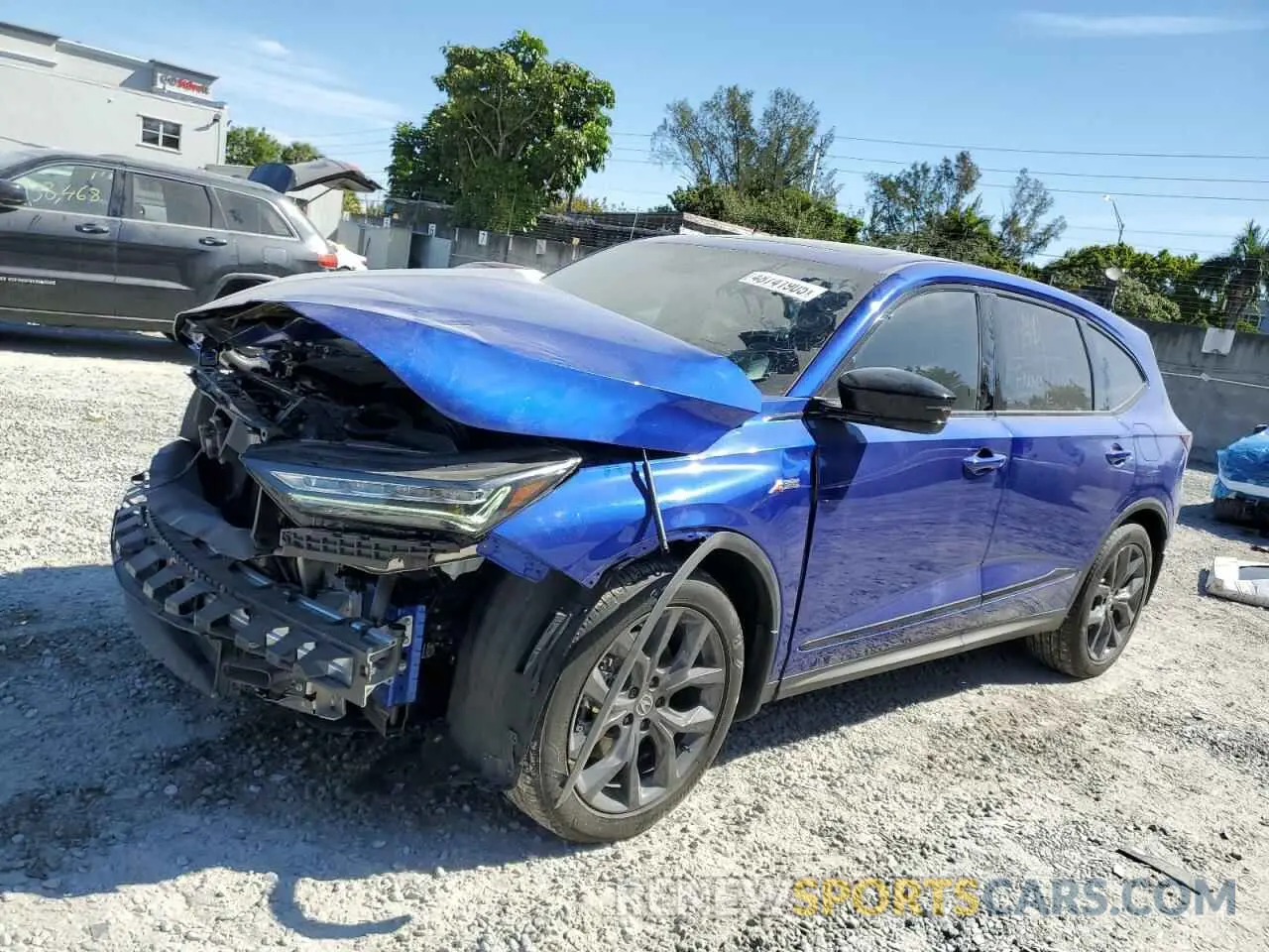 1 Photograph of a damaged car 5J8YE1H05PL012993 ACURA MDX 2023