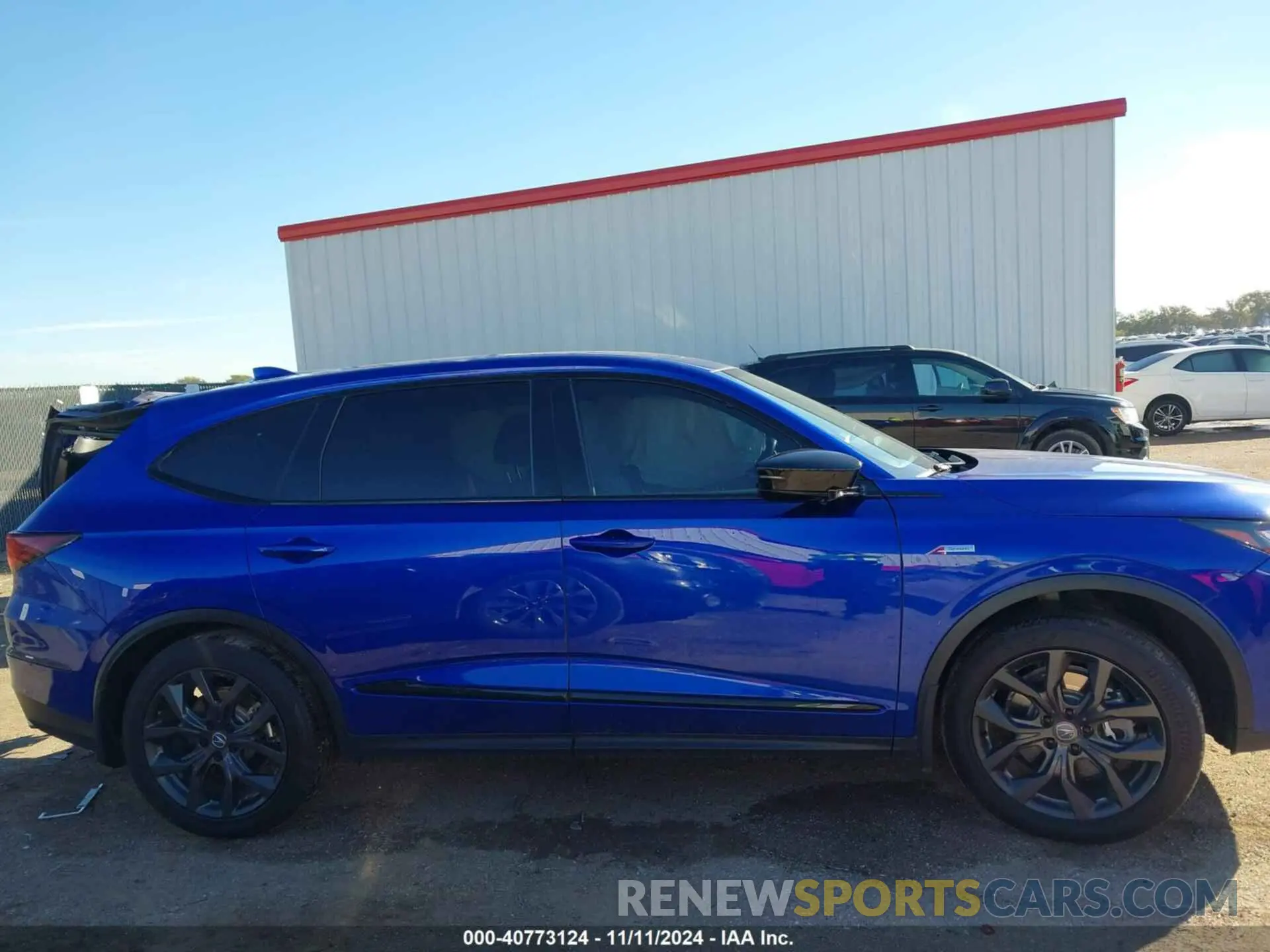 13 Photograph of a damaged car 5J8YE1H06PL003364 ACURA MDX 2023