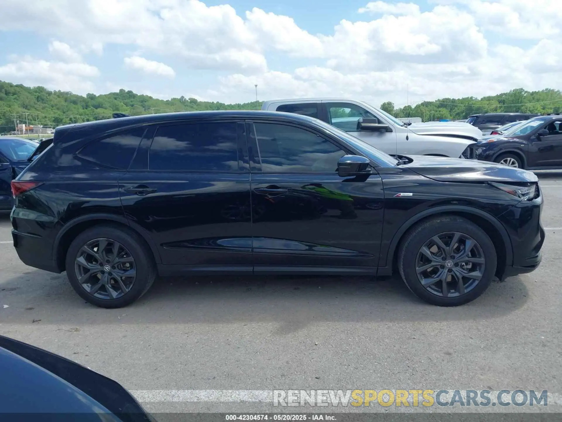 13 Photograph of a damaged car 5J8YE1H07PL009612 ACURA MDX 2023