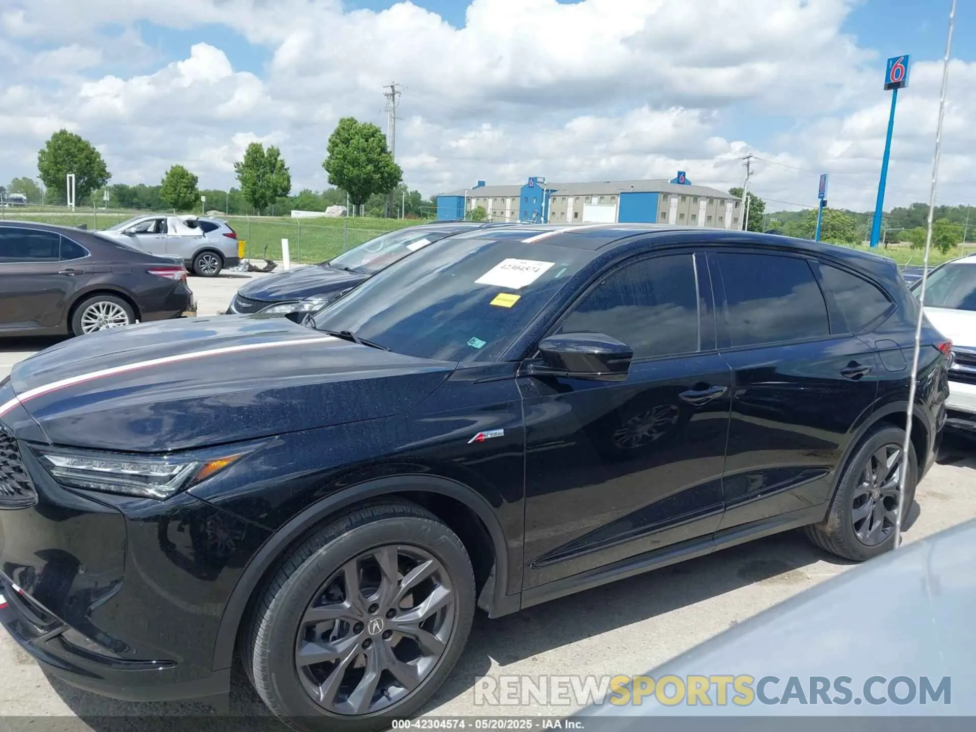14 Photograph of a damaged car 5J8YE1H07PL009612 ACURA MDX 2023