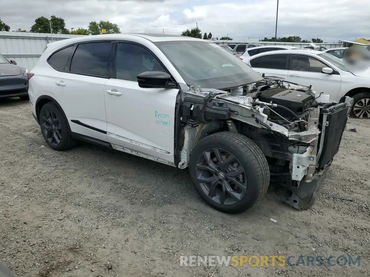 4 Photograph of a damaged car 5J8YE1H09PL001351 ACURA MDX 2023