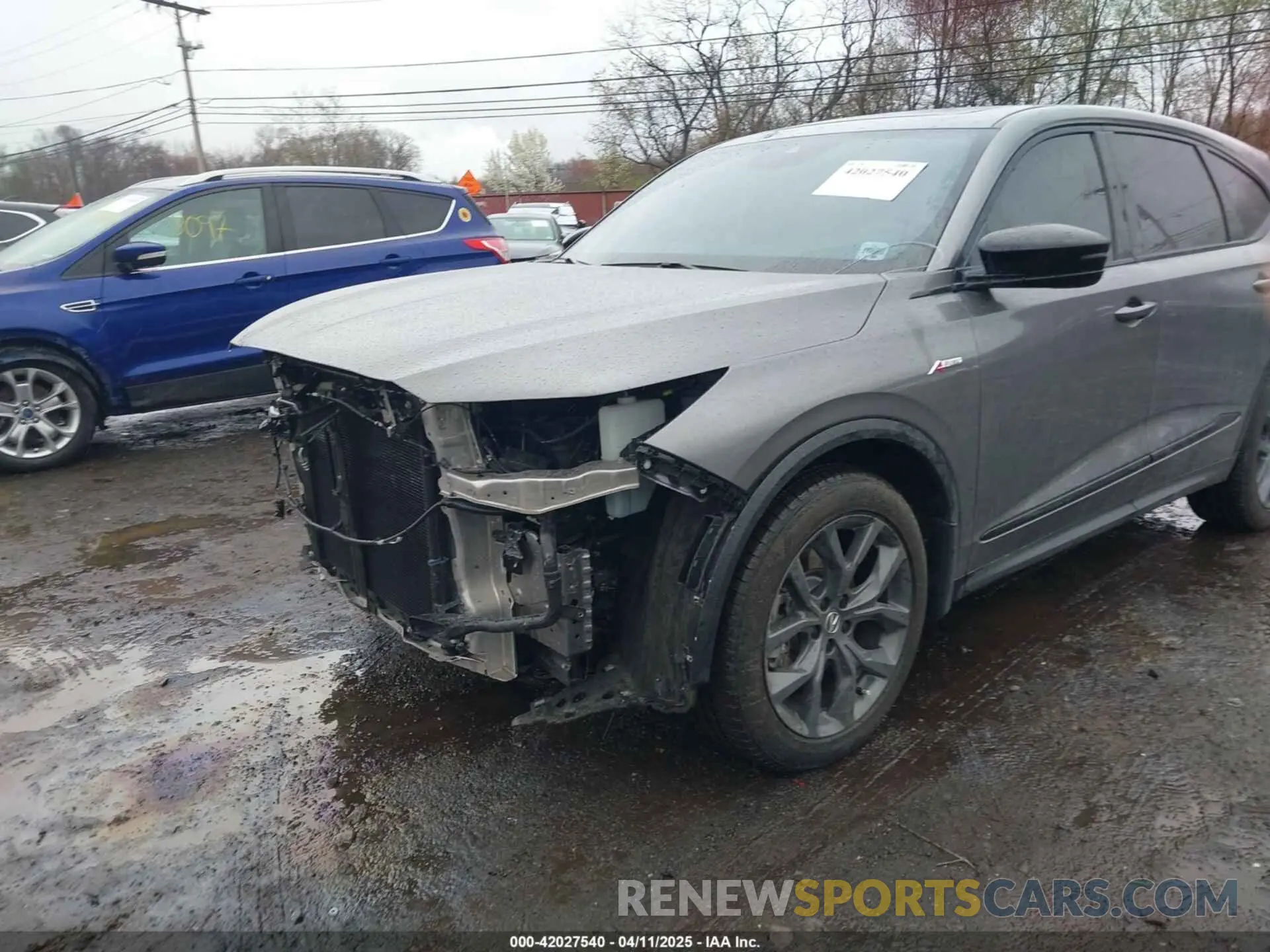 6 Photograph of a damaged car 5J8YE1H09PL005948 ACURA MDX 2023