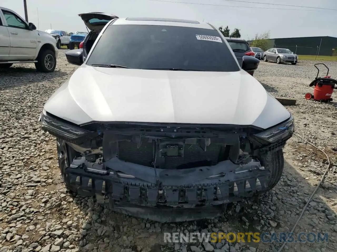 5 Photograph of a damaged car 5J8YE1H09PL011250 ACURA MDX 2023