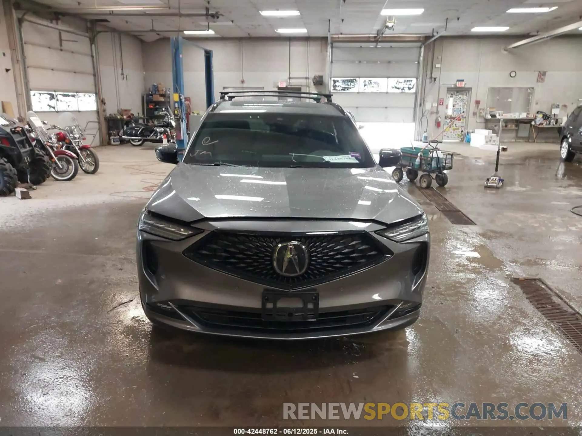12 Photograph of a damaged car 5J8YE1H0XPL043110 ACURA MDX 2023