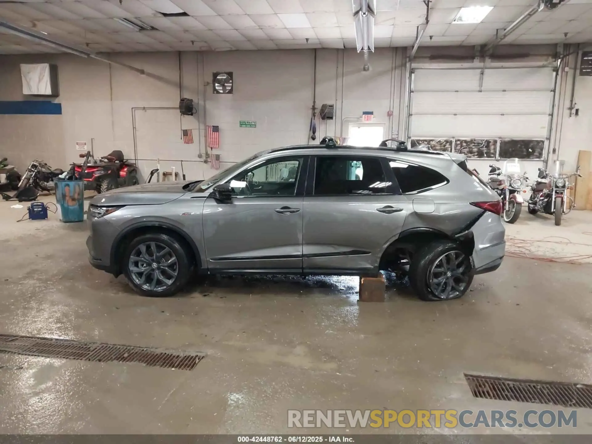 14 Photograph of a damaged car 5J8YE1H0XPL043110 ACURA MDX 2023