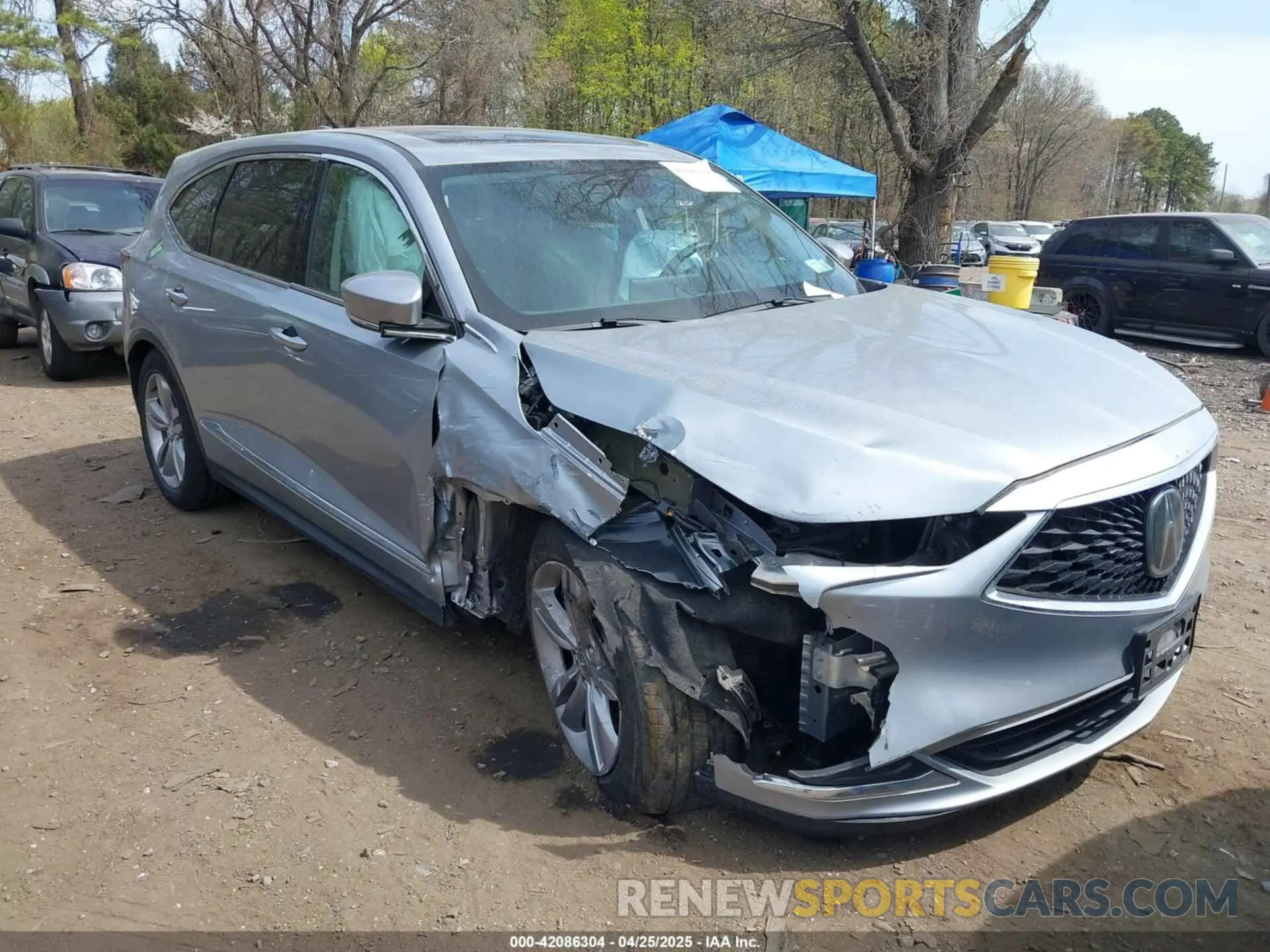 1 Photograph of a damaged car 5J8YE1H35PL009408 ACURA MDX 2023