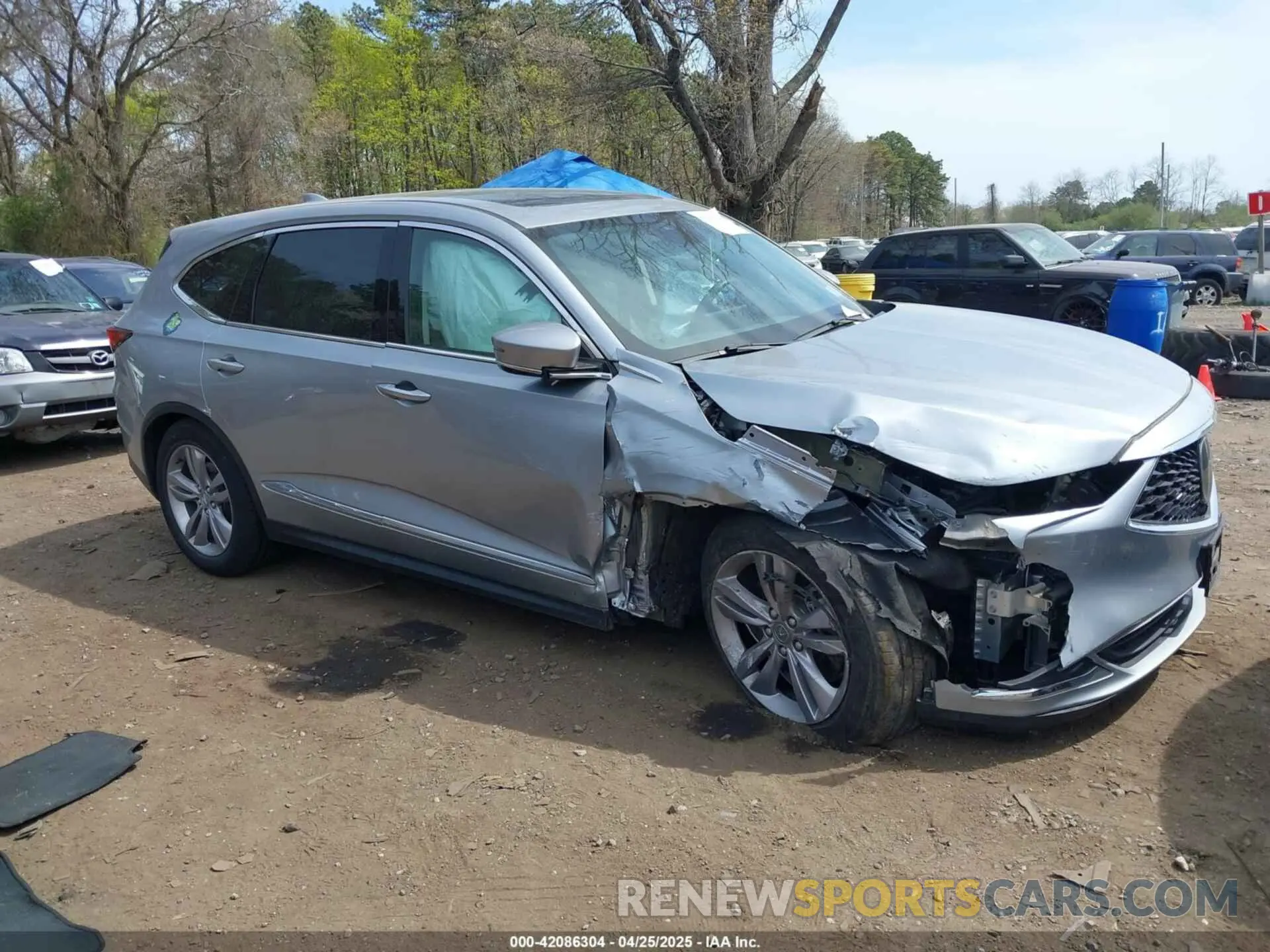 13 Photograph of a damaged car 5J8YE1H35PL009408 ACURA MDX 2023