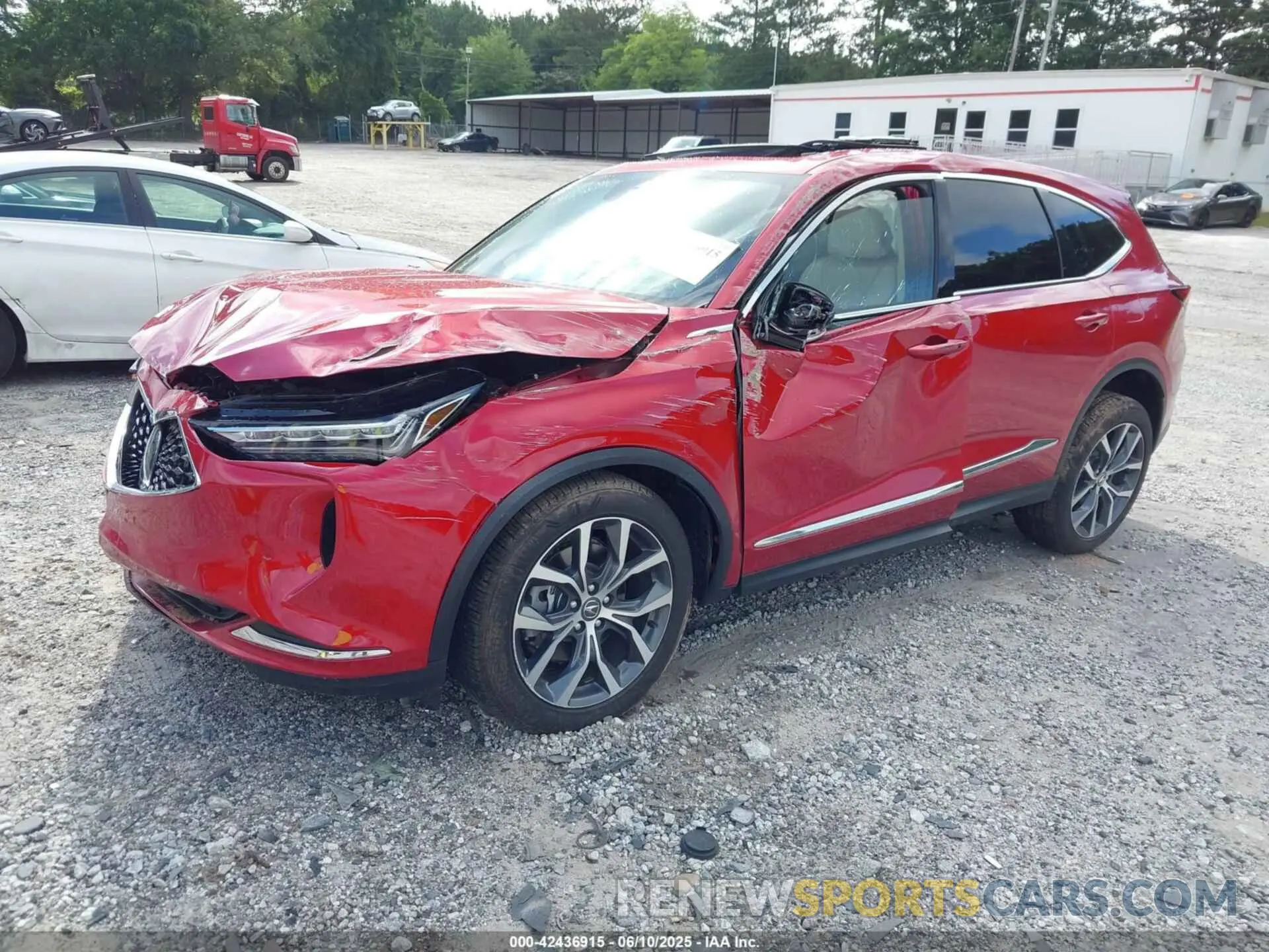 2 Photograph of a damaged car 5J8YE1H40PL007347 ACURA MDX 2023